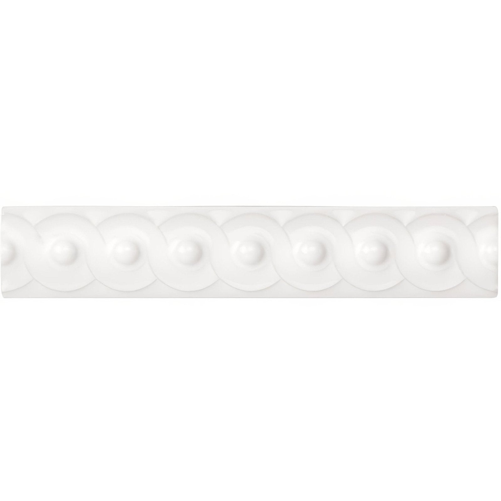 Brilliant white scroll moulding featuring white ceramic crown molding with a repeating pattern of raised circles and dots