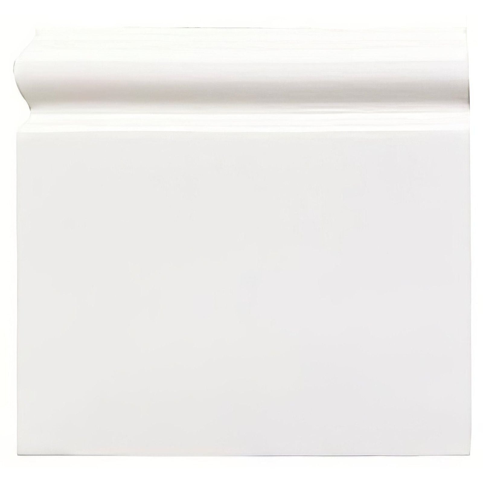 Brilliant white skirting left external corner with white painted wood baseboard and smooth slightly curved top edge