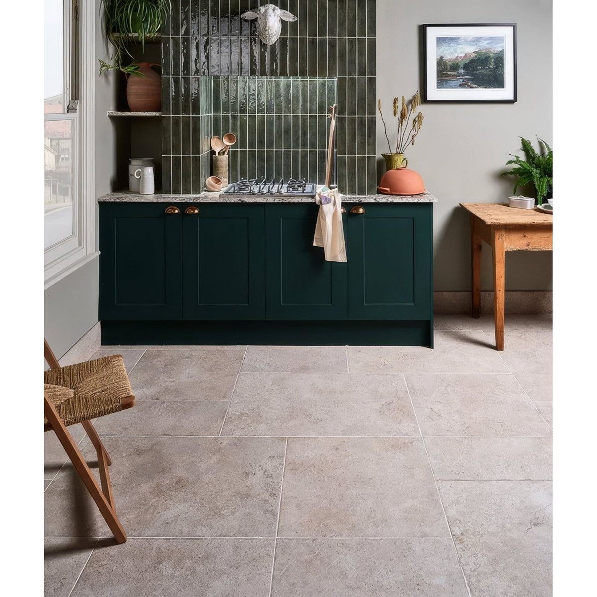 Brit stone burford porcelain 60 x 90cm with dark green shaker-style kitchen cabinets brass handles and marble countertop