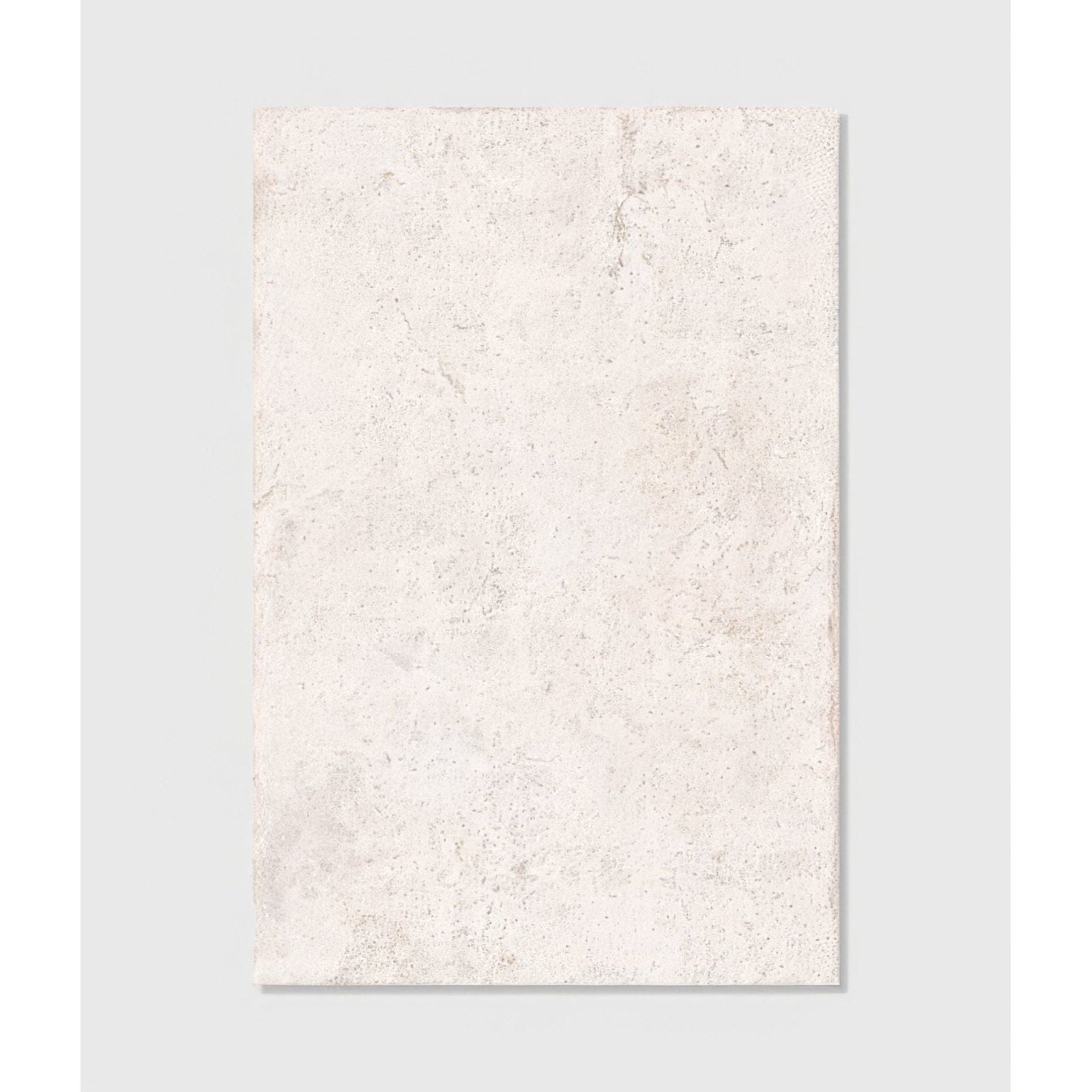 Brit stone minster porcelain tile 60 x 90cm in off-white with subtle marbled texture and faint gray veining