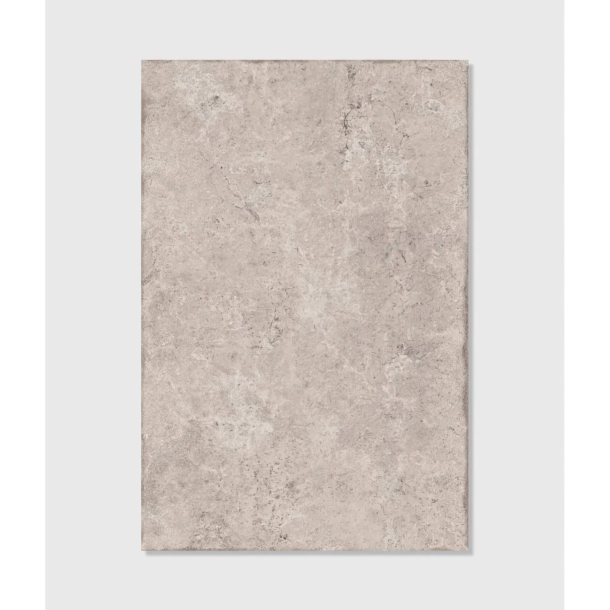 Gray stone-effect rectangular tile with a textured mottled surface brit stone pennant porcelain paving