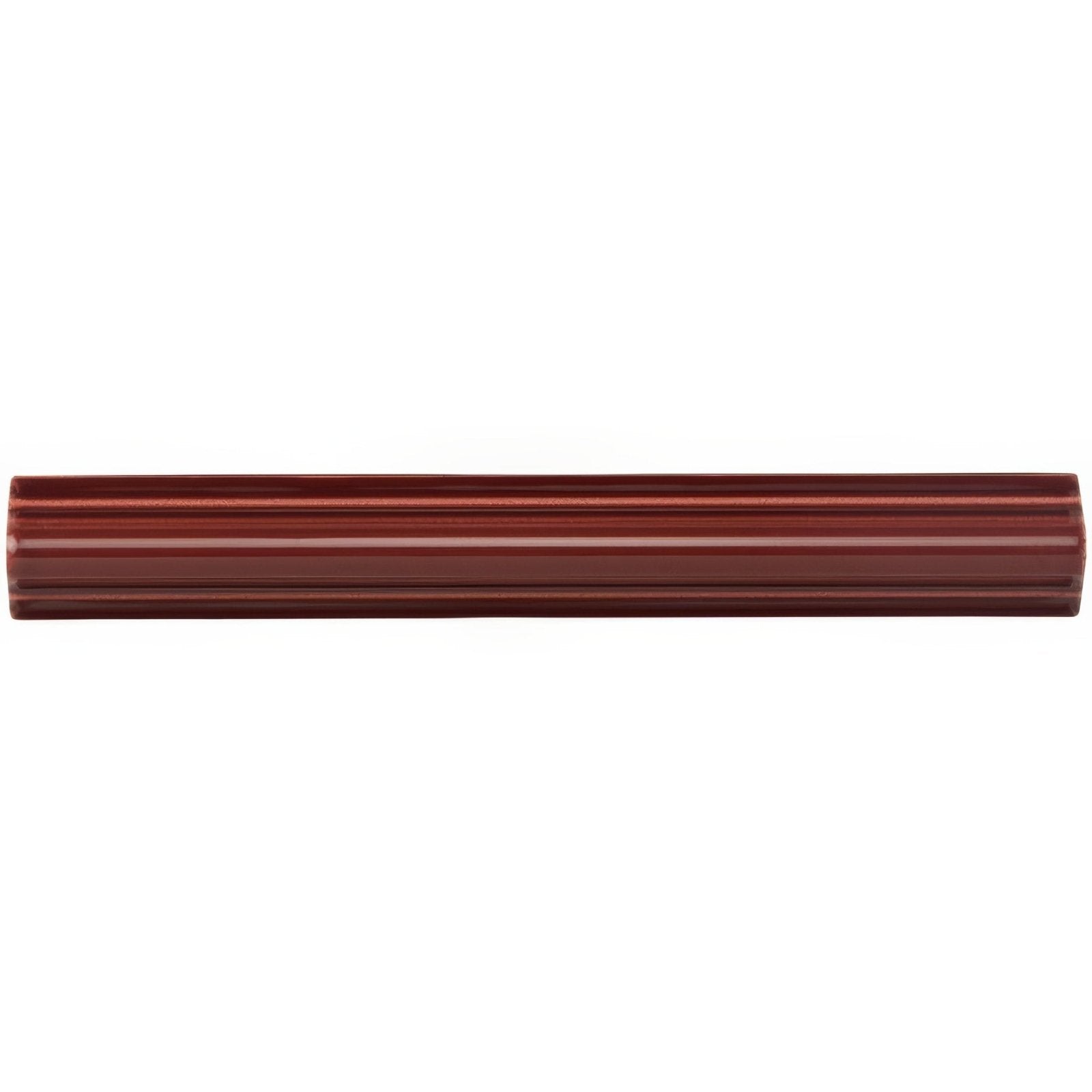 A sleek glossy burgundy ceramic astragal moulding tile with subtle ribbed texture and smooth edges