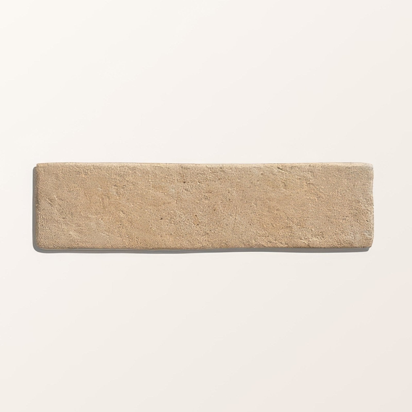 Beige rectangular porcelain tile with textured stone-like surface from buscot porcelain parquet textured collection