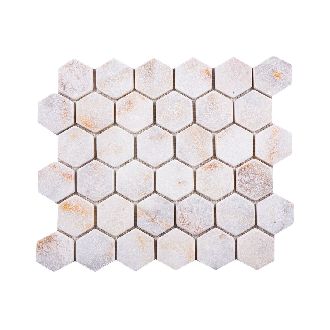 Calacatta Sugar tumbled marble hexagon mosaic sheet in white marble with warm gold veining and softened edges