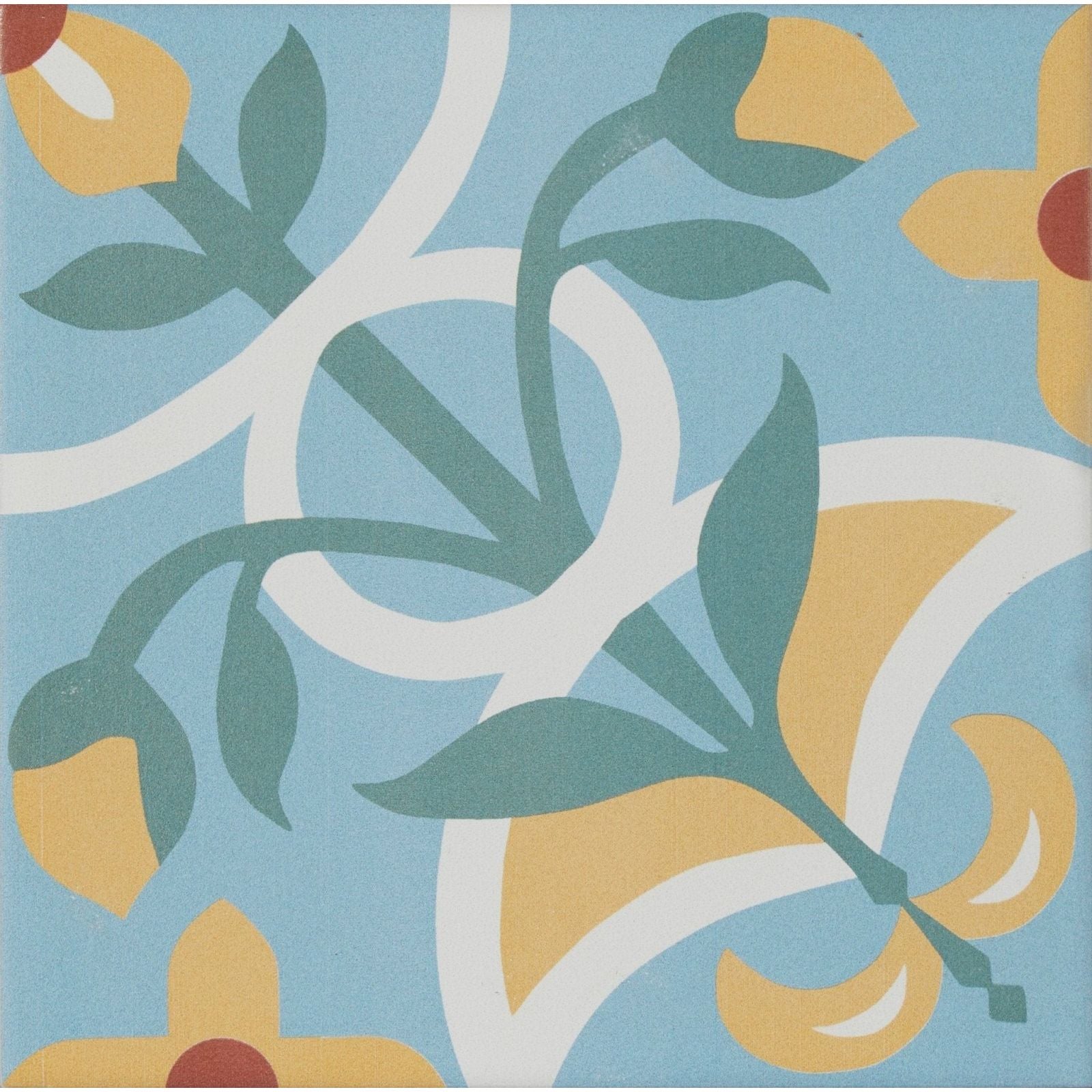 Blue cabana porcelain sicily tile featuring a stylized yellow teal green and white floral pattern on ceramic surface