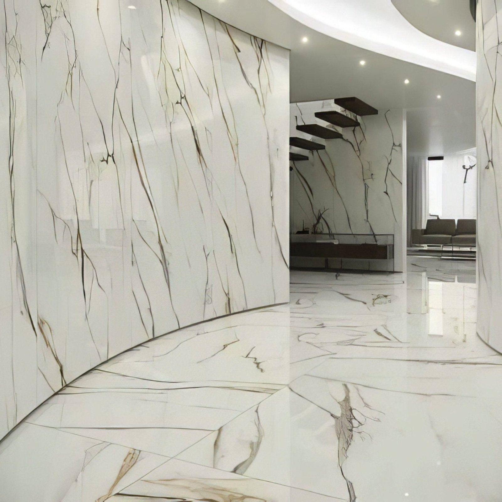 Calacatta Gold polished jumbo tiles with white marble featuring elegant black and gold veining and a high shine finish