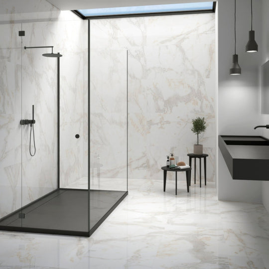Calacatta Gold Polished Porcelain Tiles white marble-effect porcelain tiles in a black-framed glass shower enclosure