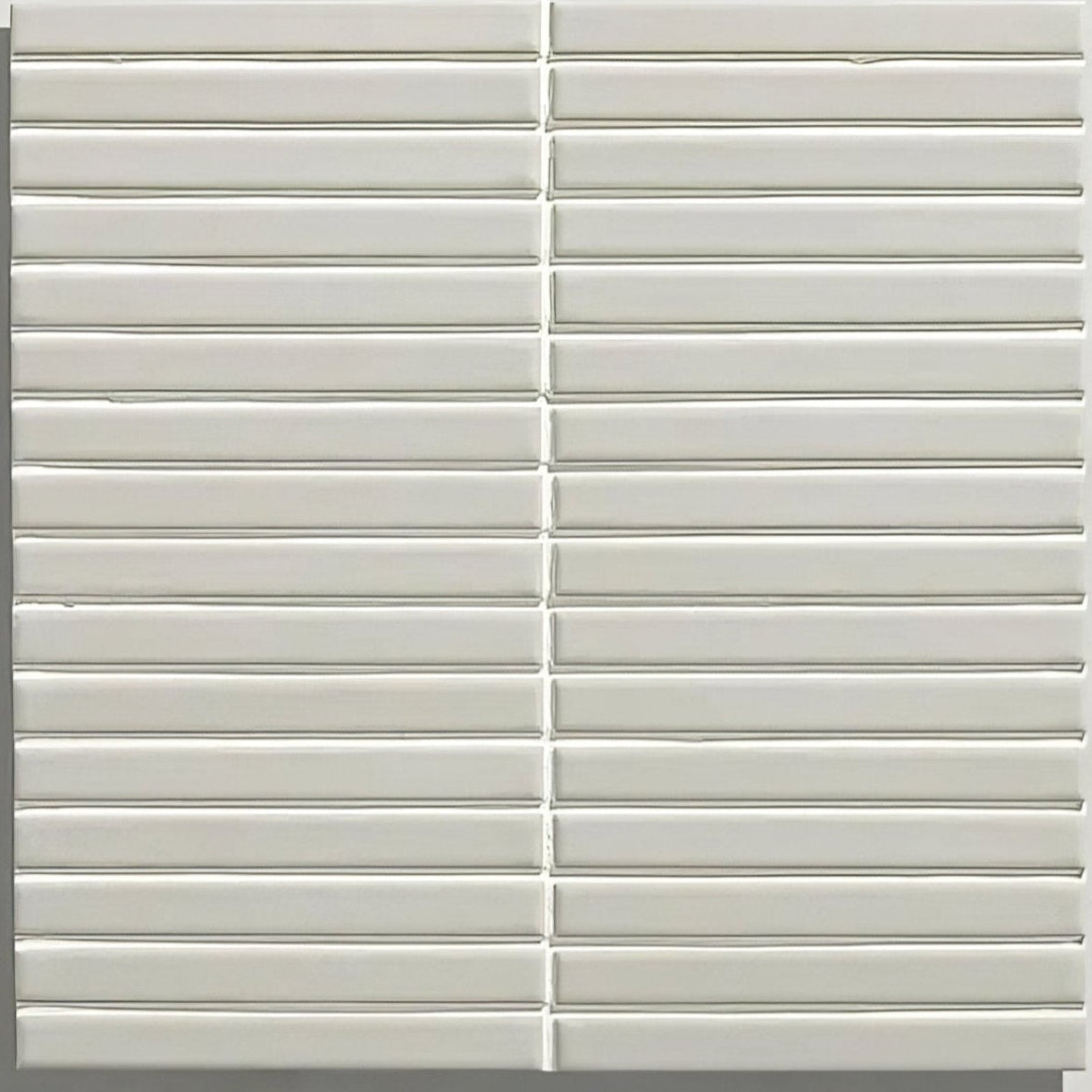 Off-white rectangular candy cane porcelain mosaic vanilla tiles with subtle glossy finish and uniform horizontal ridges