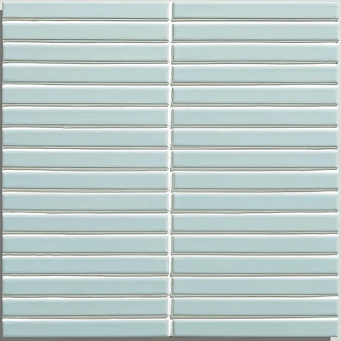 Light blue rectangular glass mosaic tiles arranged in a grid pattern candy cane porcelain mosaic wintergreen