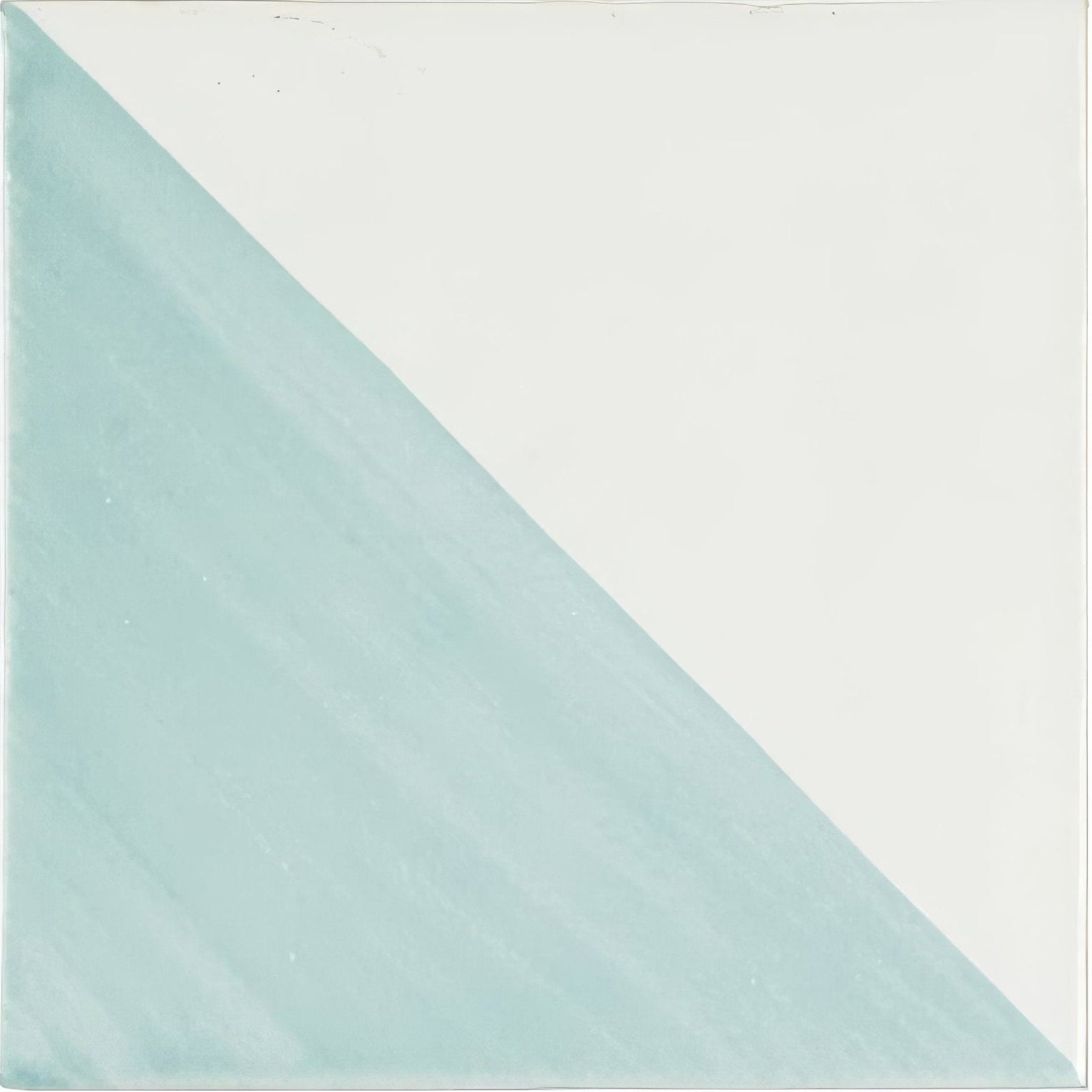 Capri Lagoon hand painted ceramic tile square with a diagonal split in soft mint green and off-white colors