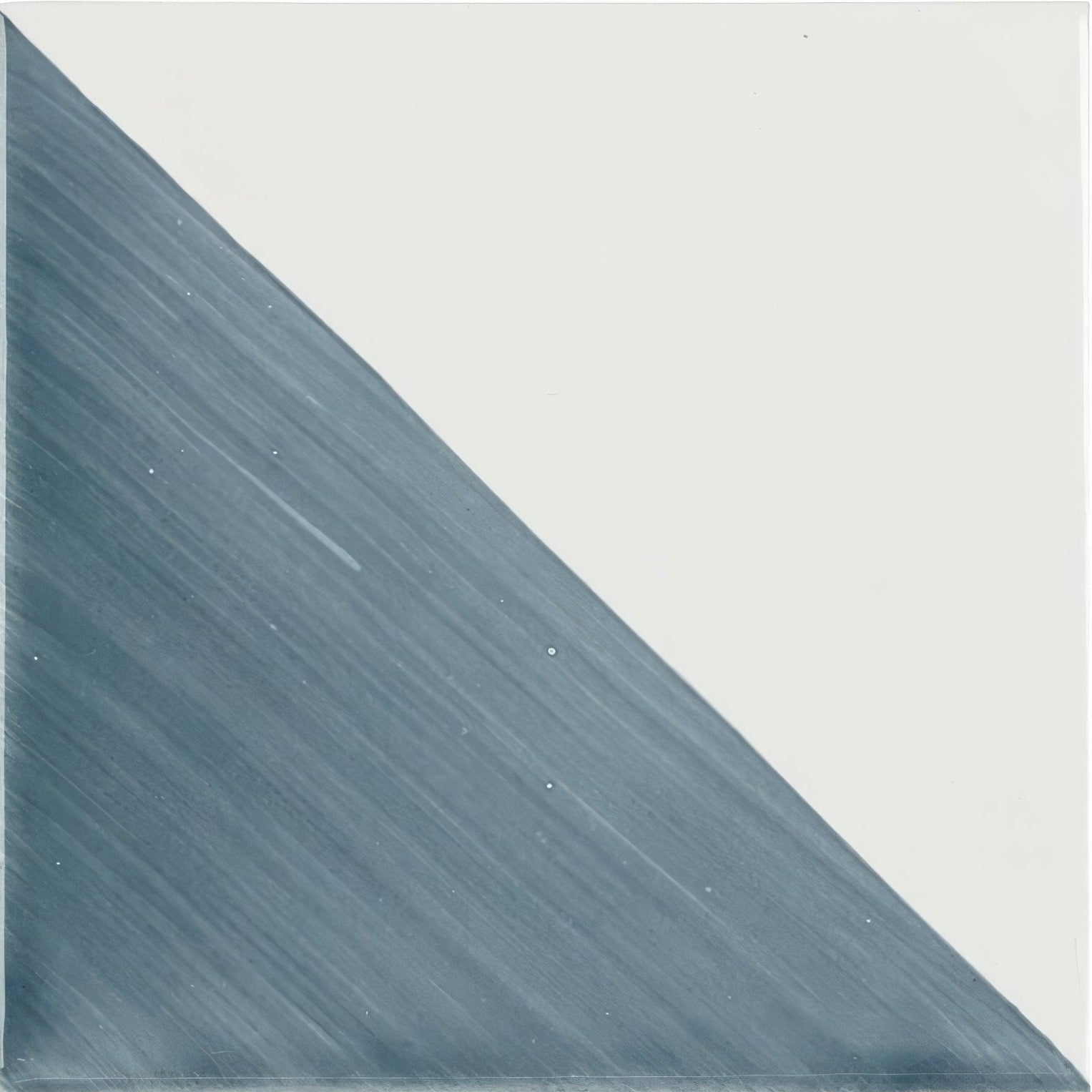 Capri Ocean hand painted tile with a minimalist abstract design featuring deep slate gray and off-white diagonal division