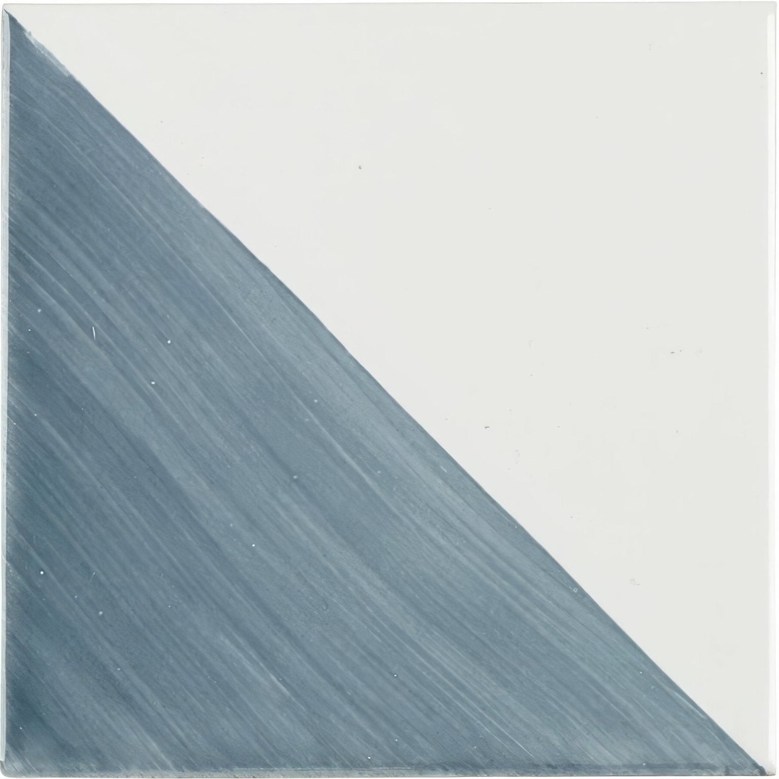A square ceramic Capri Ocean hand painted tile with a diagonal split in matte gray blue and off white colors
