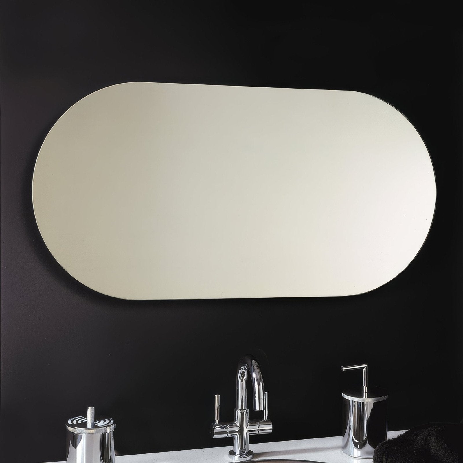 A sleek oval-shaped capsule mirror 50x100cm with a minimalist design and smooth reflective surface