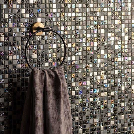 Carinthia Earth and Fire Mixed Mosaics grey, black and iridescent blue mosaic with a black towel ring and grey towel