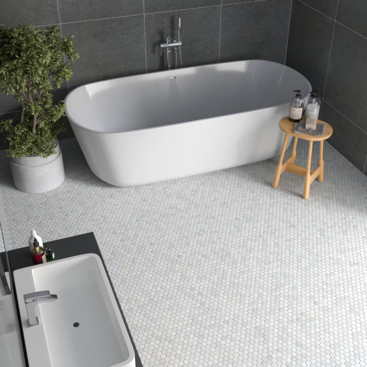 Carrara White Marble Penny Mosaic Tile white circular marble penny mosaic with a freestanding bathtub