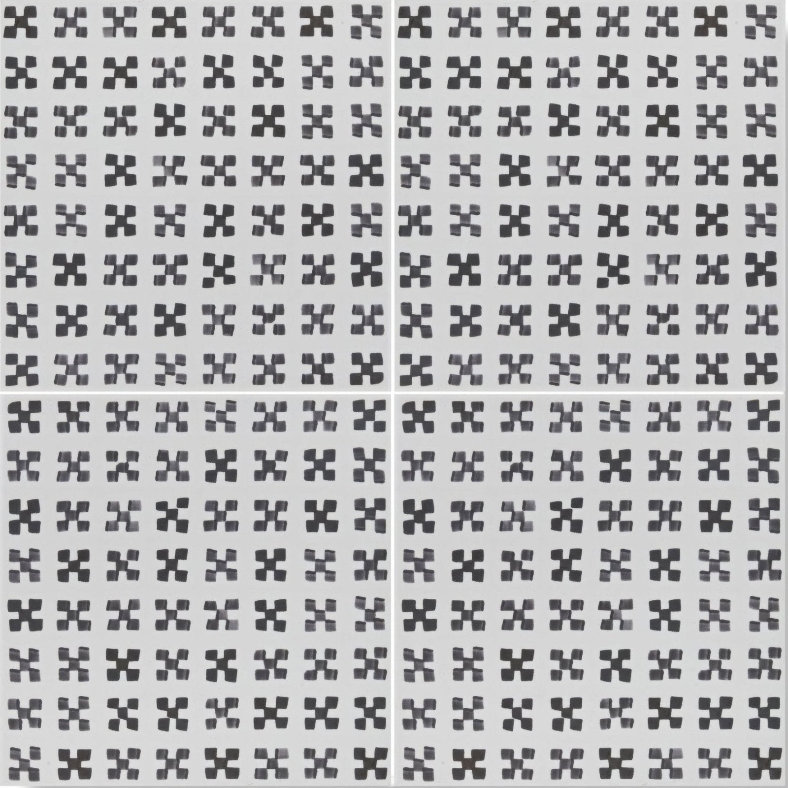 Casino baccarat patterned tile featuring black x-shaped ceramic tiles arranged in a grid on a light gray background
