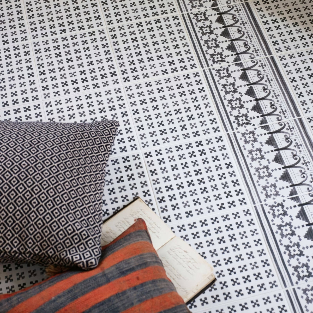 Casino baccarat patterned tile with black and white geometric cross design for floor installation