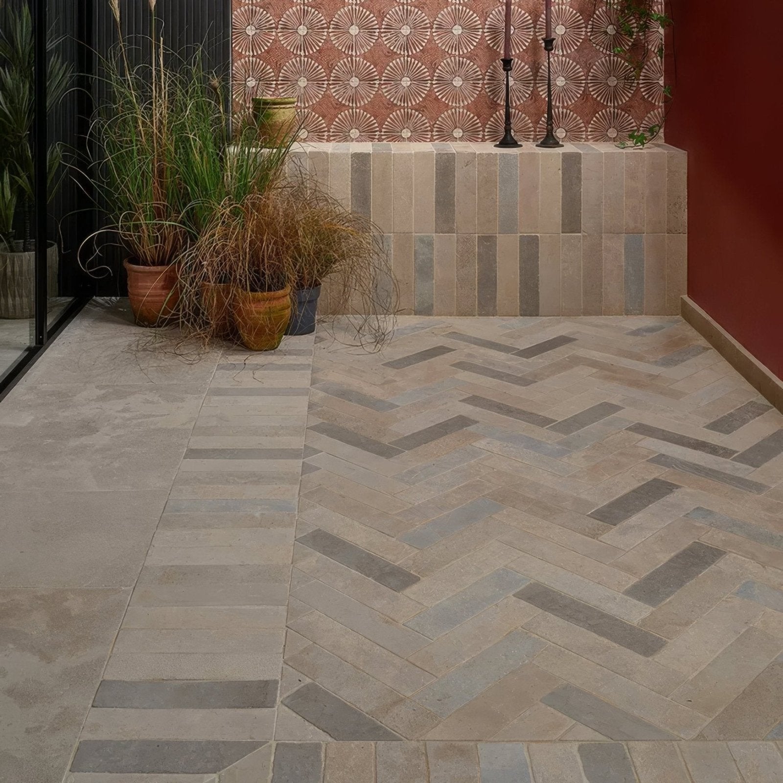 Beige and gray herringbone patterned castilan limestone parquet tumbled stone floor tiles