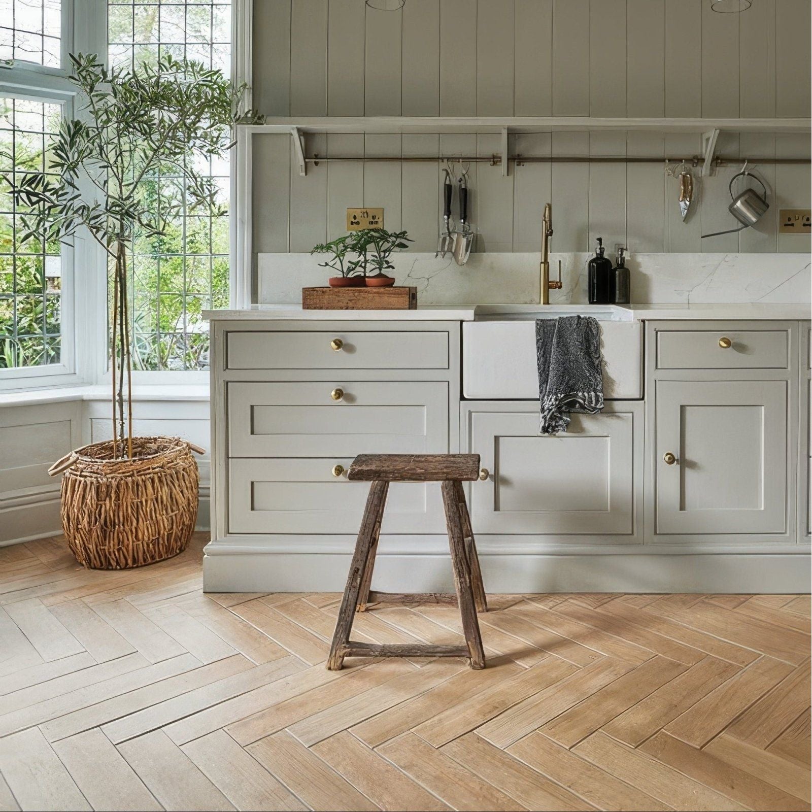 Rustic wooden stool with weathered finish and simple sturdy design in chatham porcelain oak wood