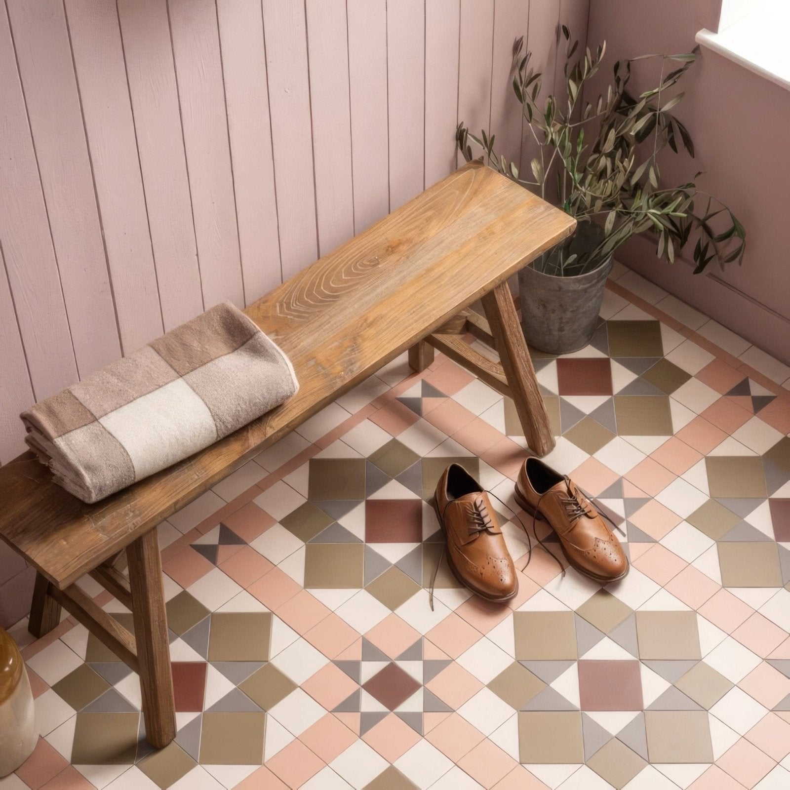 A rustic wooden bench with natural grain finish and sturdy legs in chatsworth brown, carnation pink, dover white, green, and revival grey