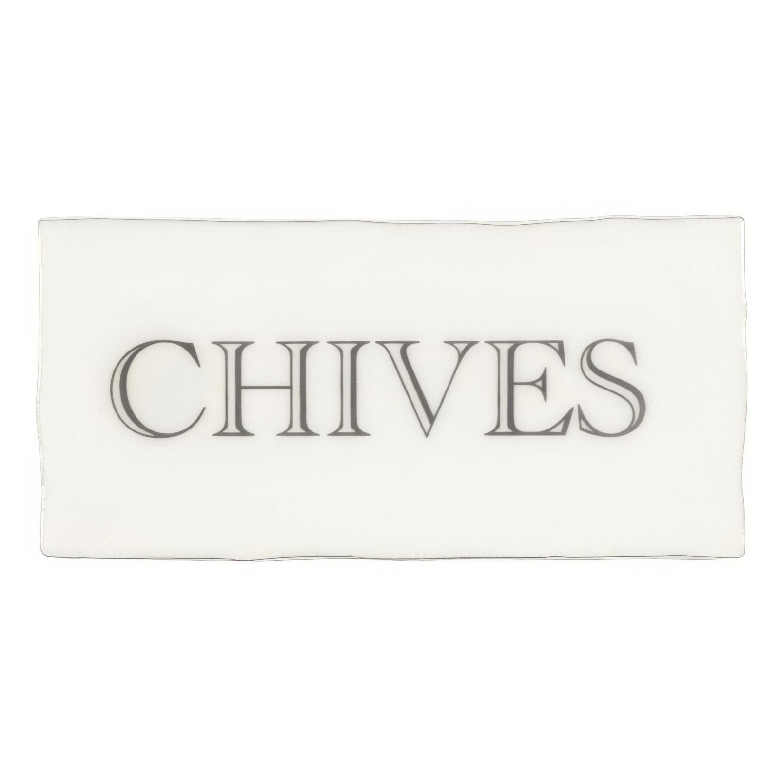 White cotton rectangular towel with the word chives printed in dark gray serif font on the center