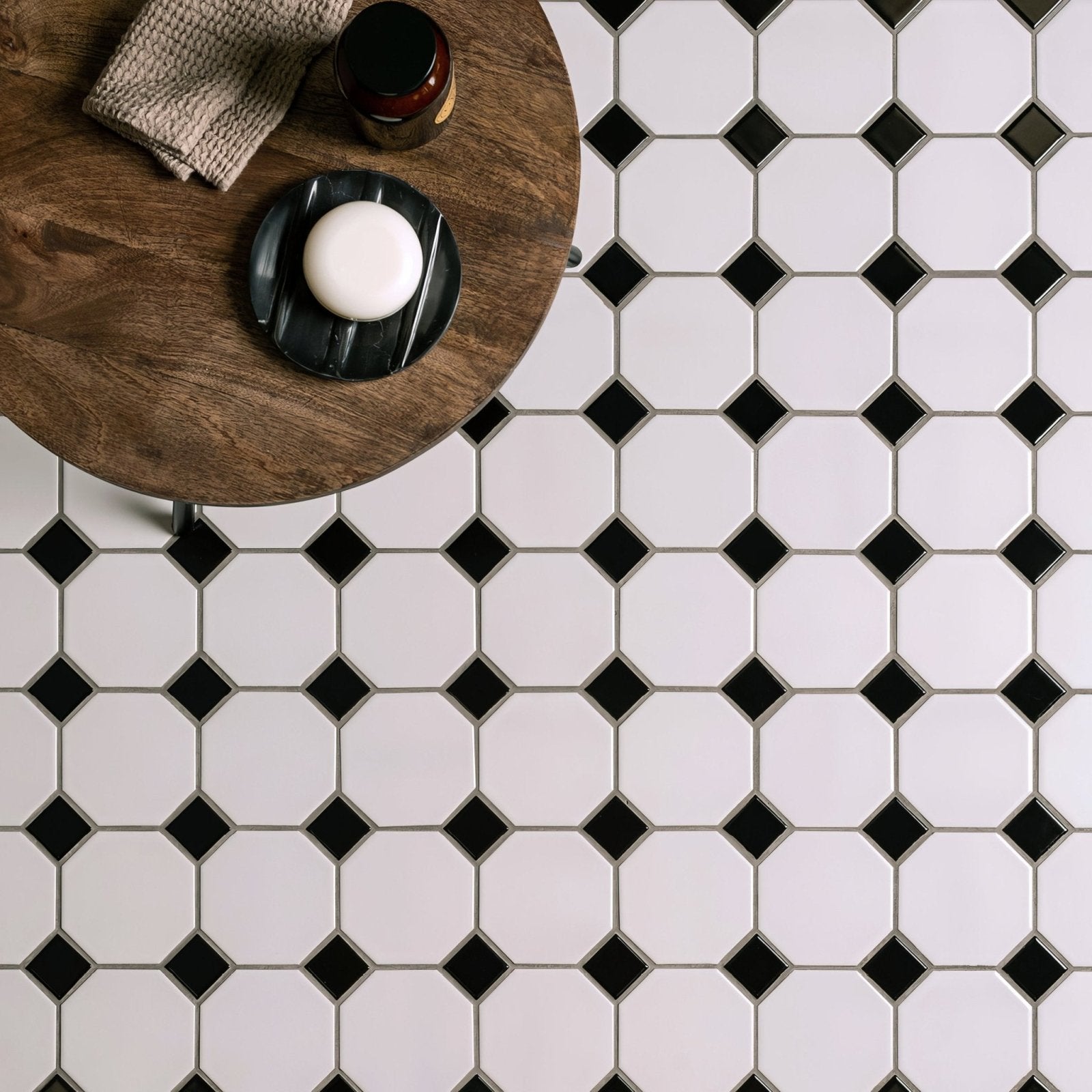 Black and white classic octagon and dot floor mosaic with geometric diamond patterned tile flooring design