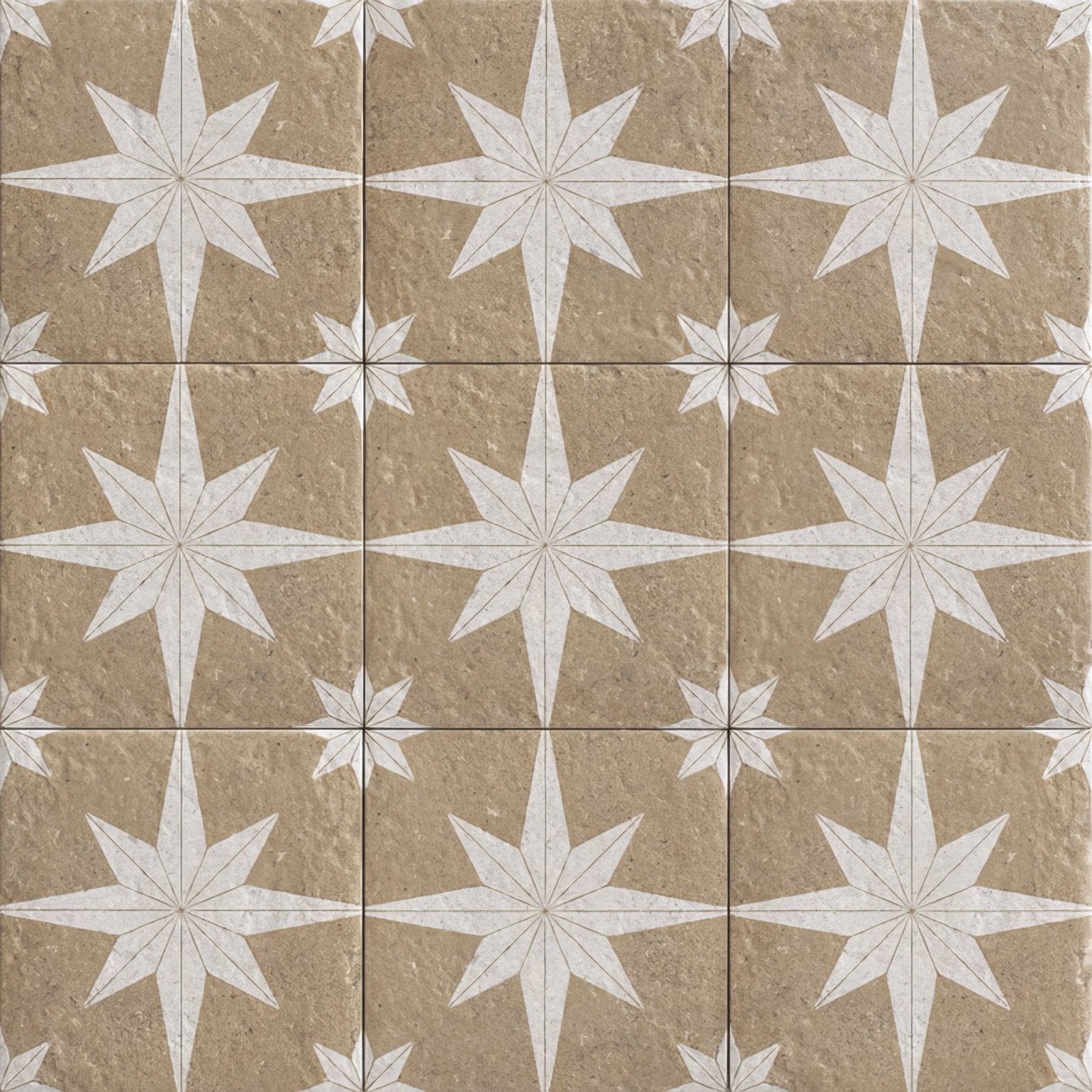 Beige stone tiles with white starburst inlay patterns from compass sand beige collection for interior flooring