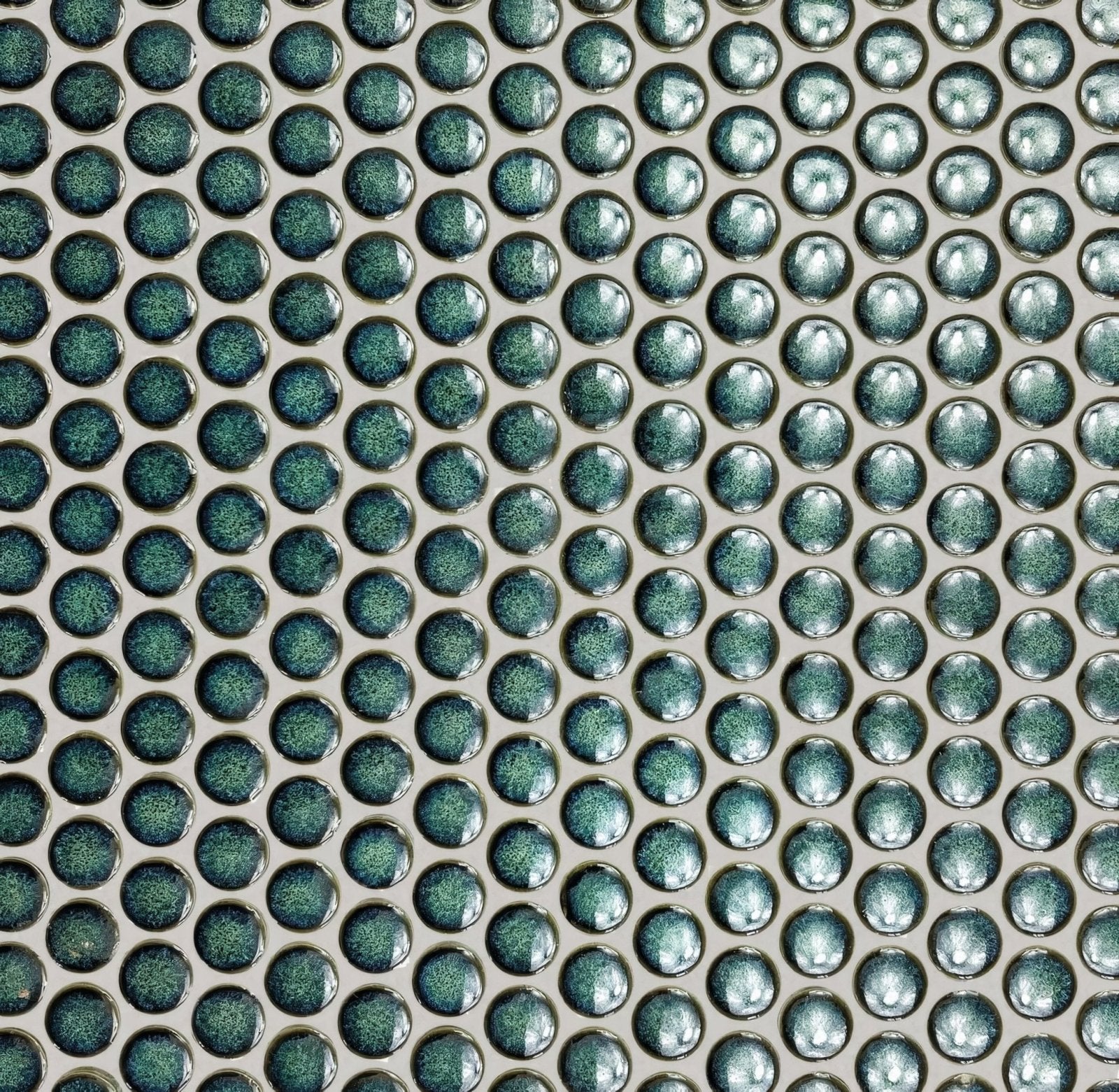 Copenhagen penny round dark green mosaic tile with teal-green metallic glossy speckled finish for walls and backsplashes
