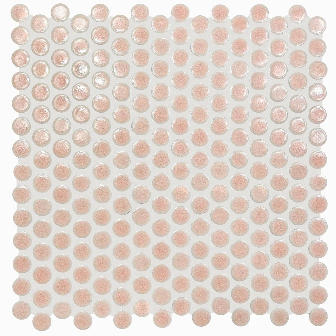 A sheet of copenhagen penny round pink mosaic rose gold glass tiles with a glossy reflective surface