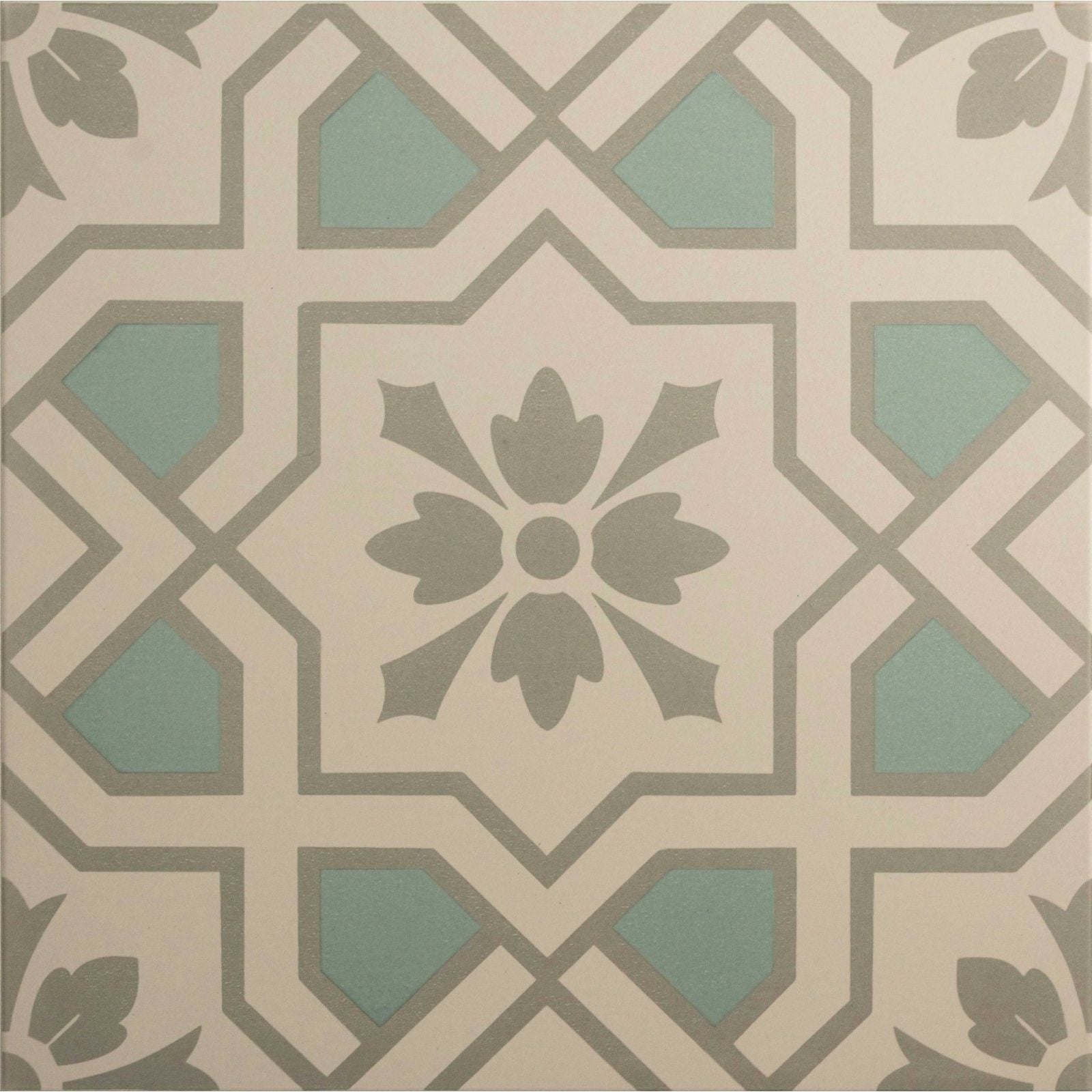 Beige and sage green geometric patterned tile with a central floral motif from cotehele teal on chalk collection