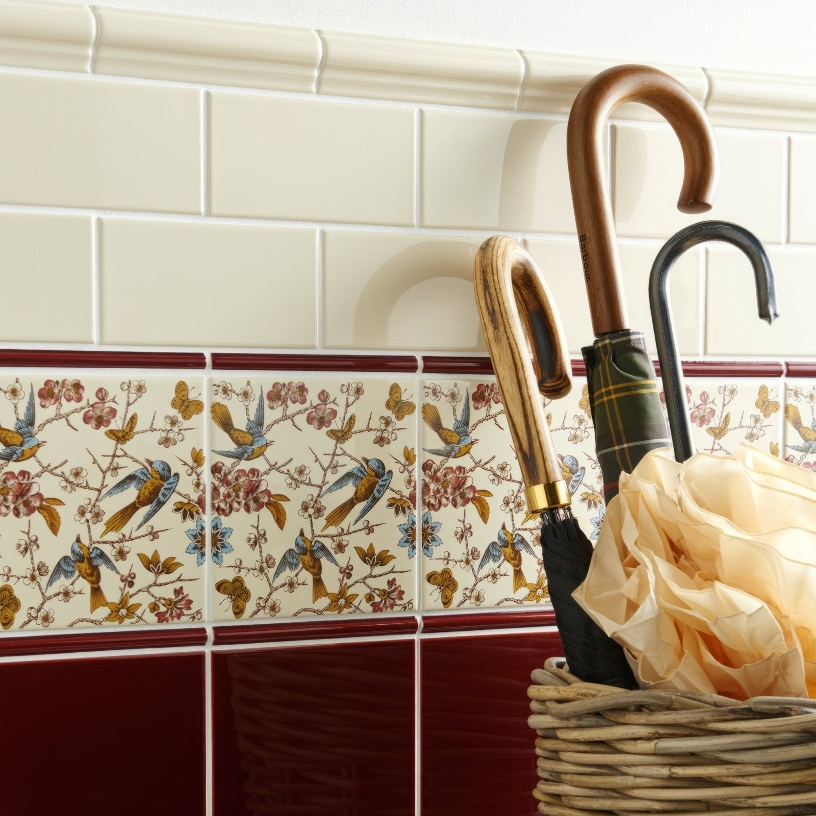 County white albert moulding decorative ceramic tile strip with delicate bird butterfly and blossom pattern in soft blues pinks and golds