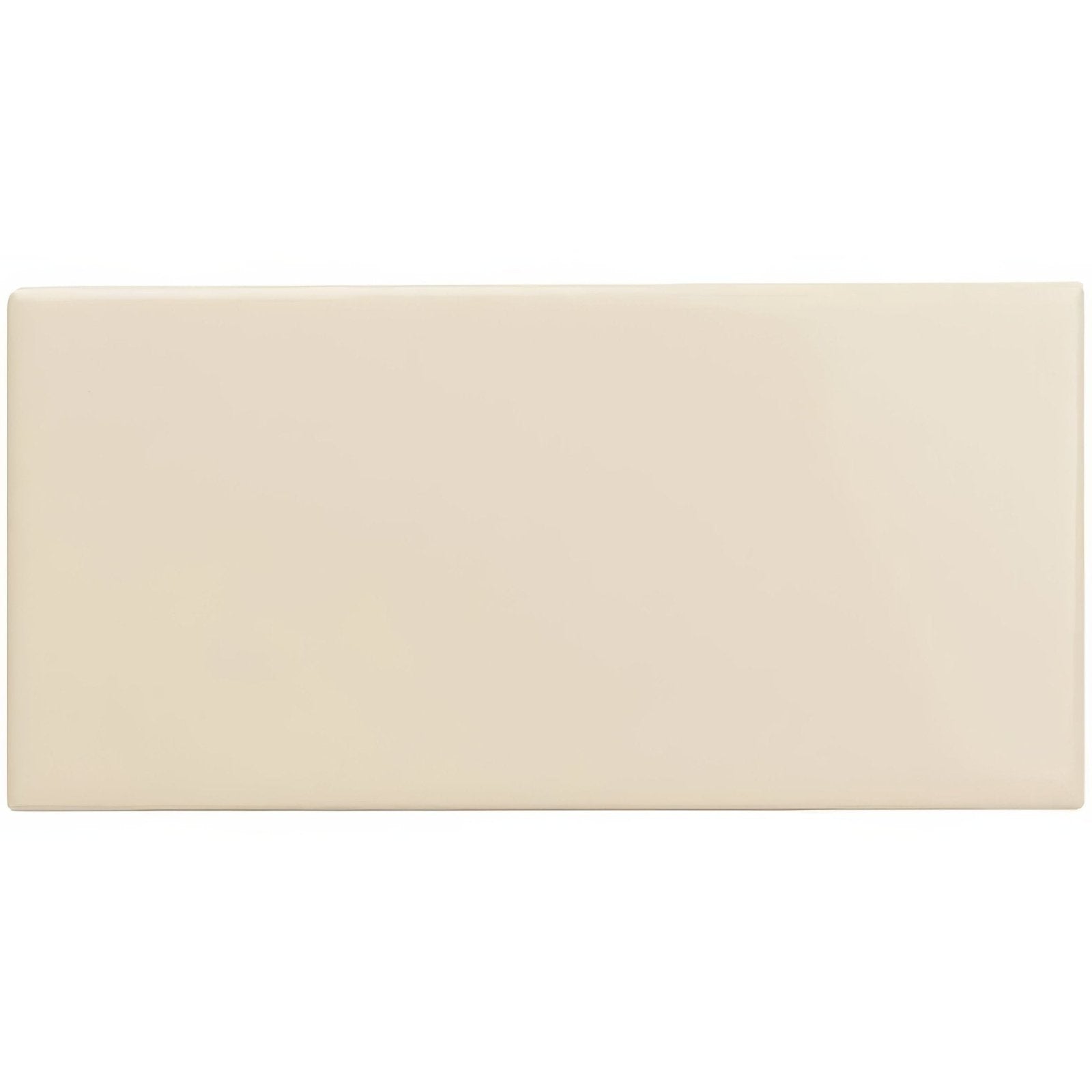Cream-colored rectangular ceramic County White half tile with smooth glossy finish ideal for walls and backsplashes