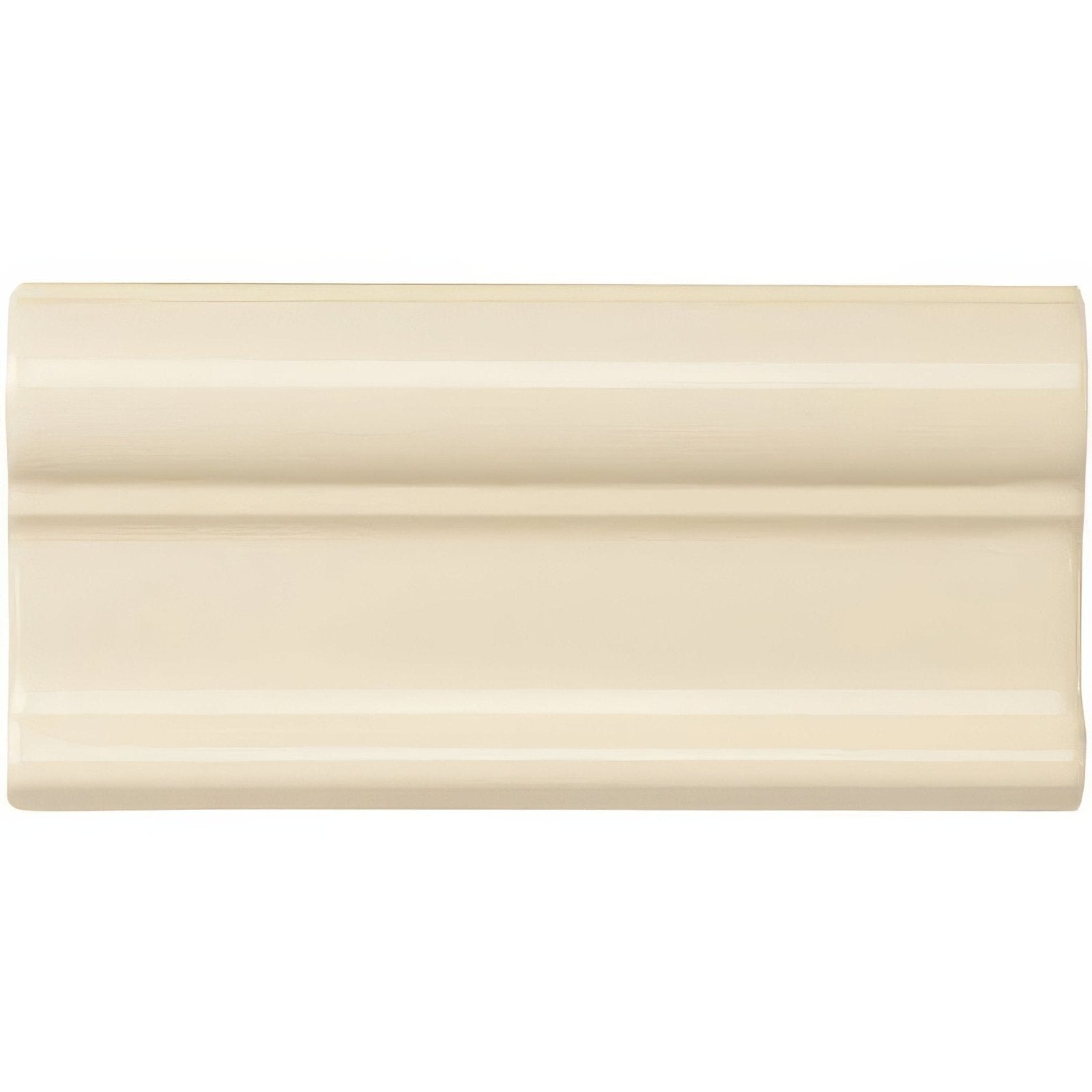 Cream-colored ceramic county white victoria moulding baseboard with smooth glossy finish and subtle horizontal ridges