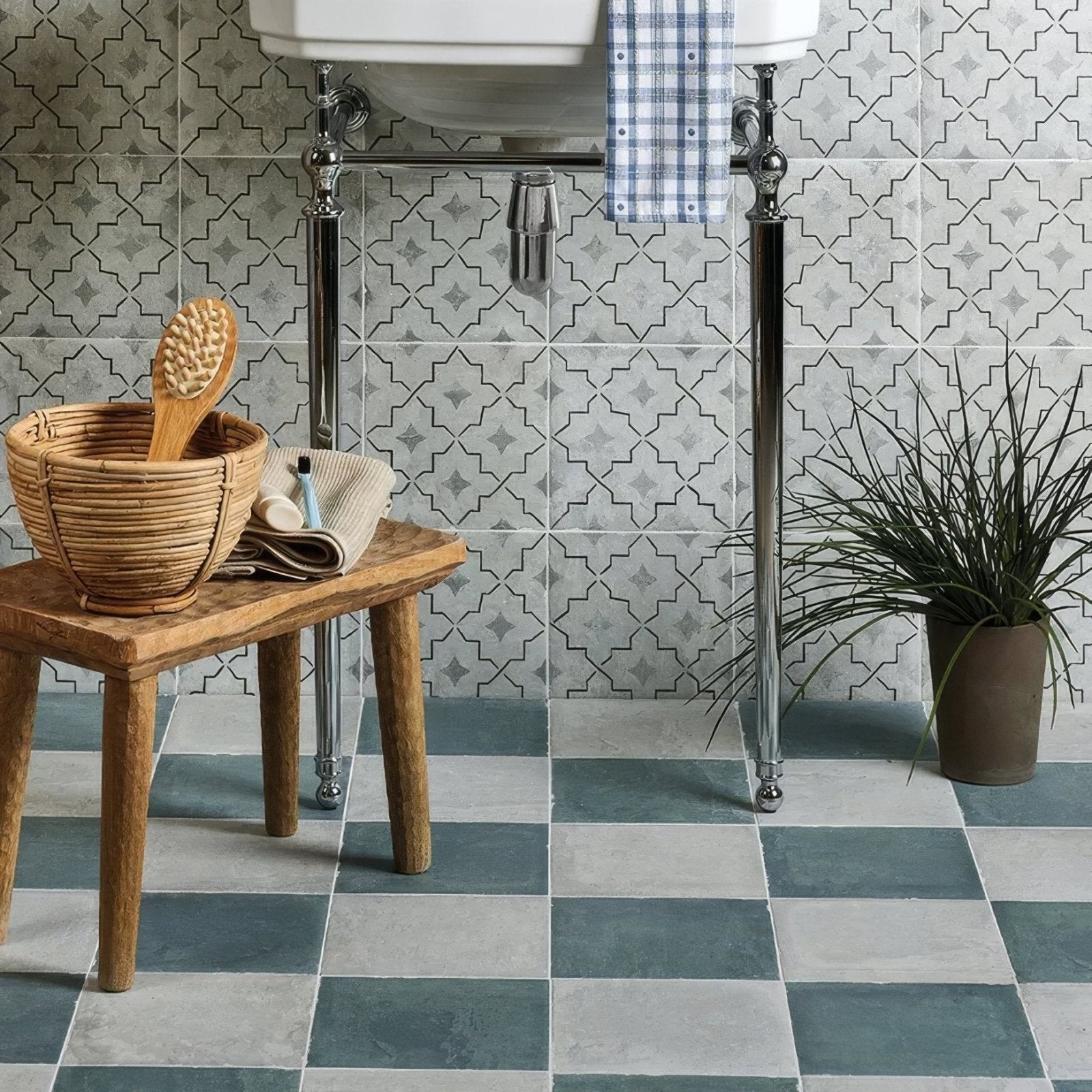 Woven wicker basket with a wooden brush inside featuring cuba porcelain mint green field design