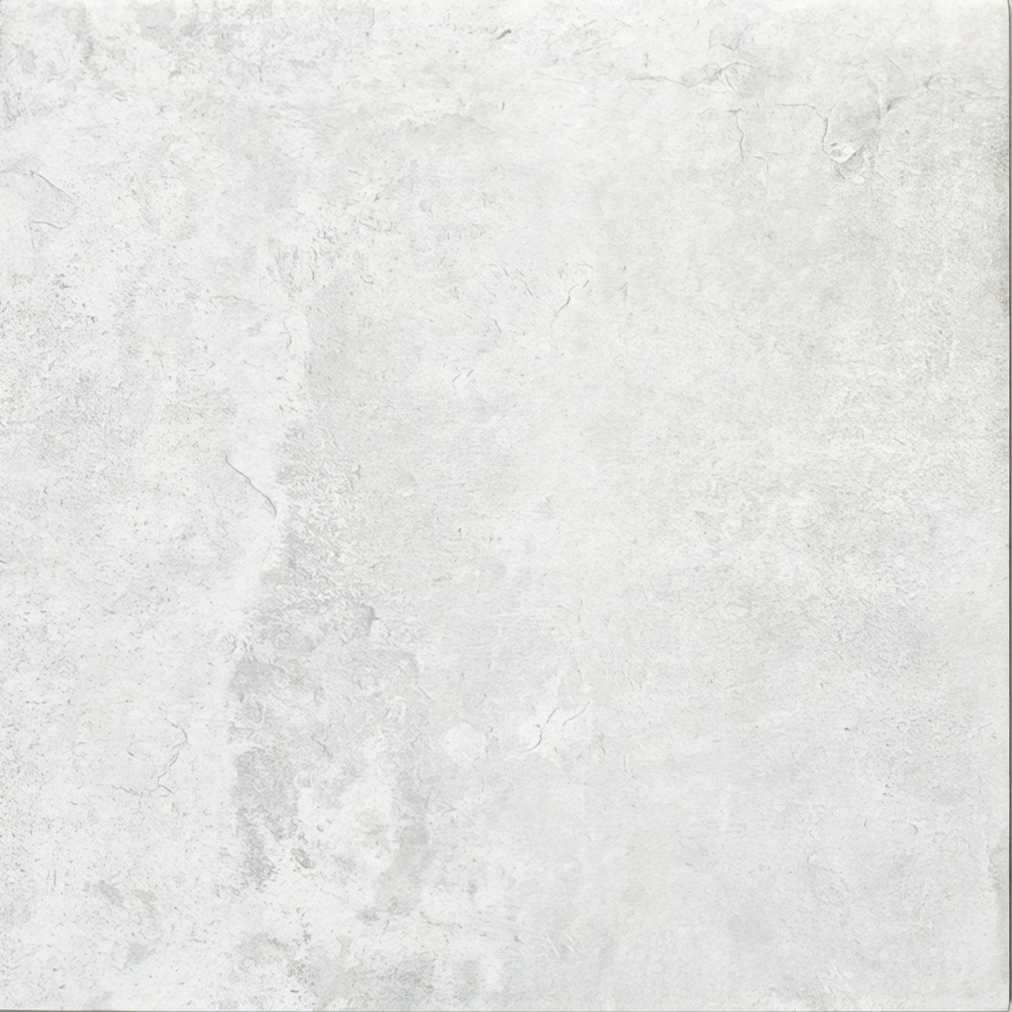 White textured porcelain tile with subtle gray veining from Cuba porcelain pearl grey field collection