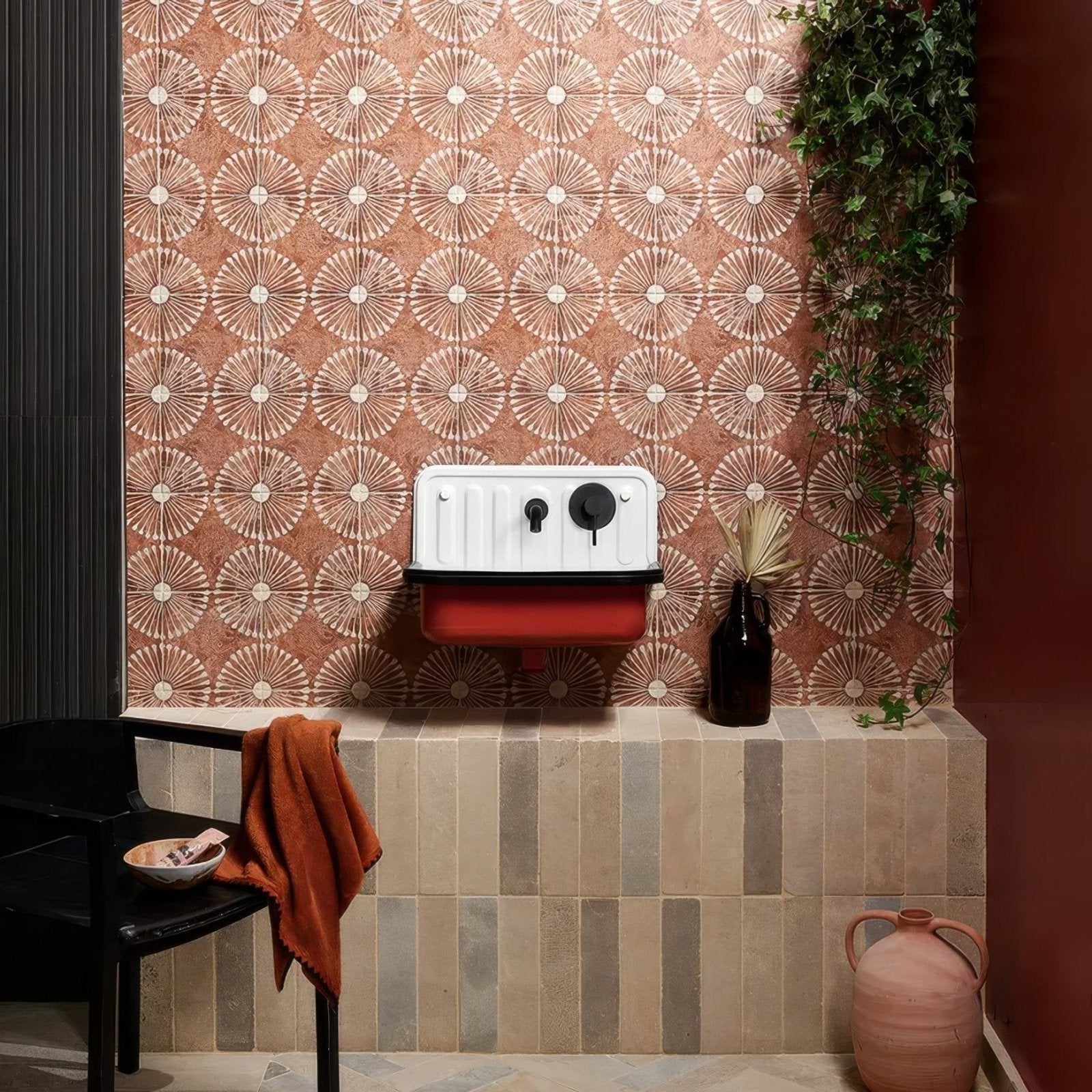 White and red porcelain wall-mounted Cuba vedado cotto sink with black knobs for bathroom use