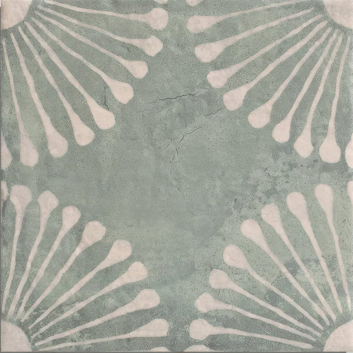 A square ceramic porcelain tile with a muted mint green base and distressed white teardrop pattern called cuba porcelain vedado mint green