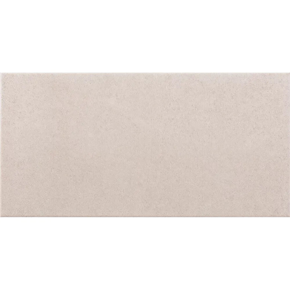 Beige rectangular ceramic tile dafine marfil matt 25 x 50cm with a subtle textured surface for wall and floor use