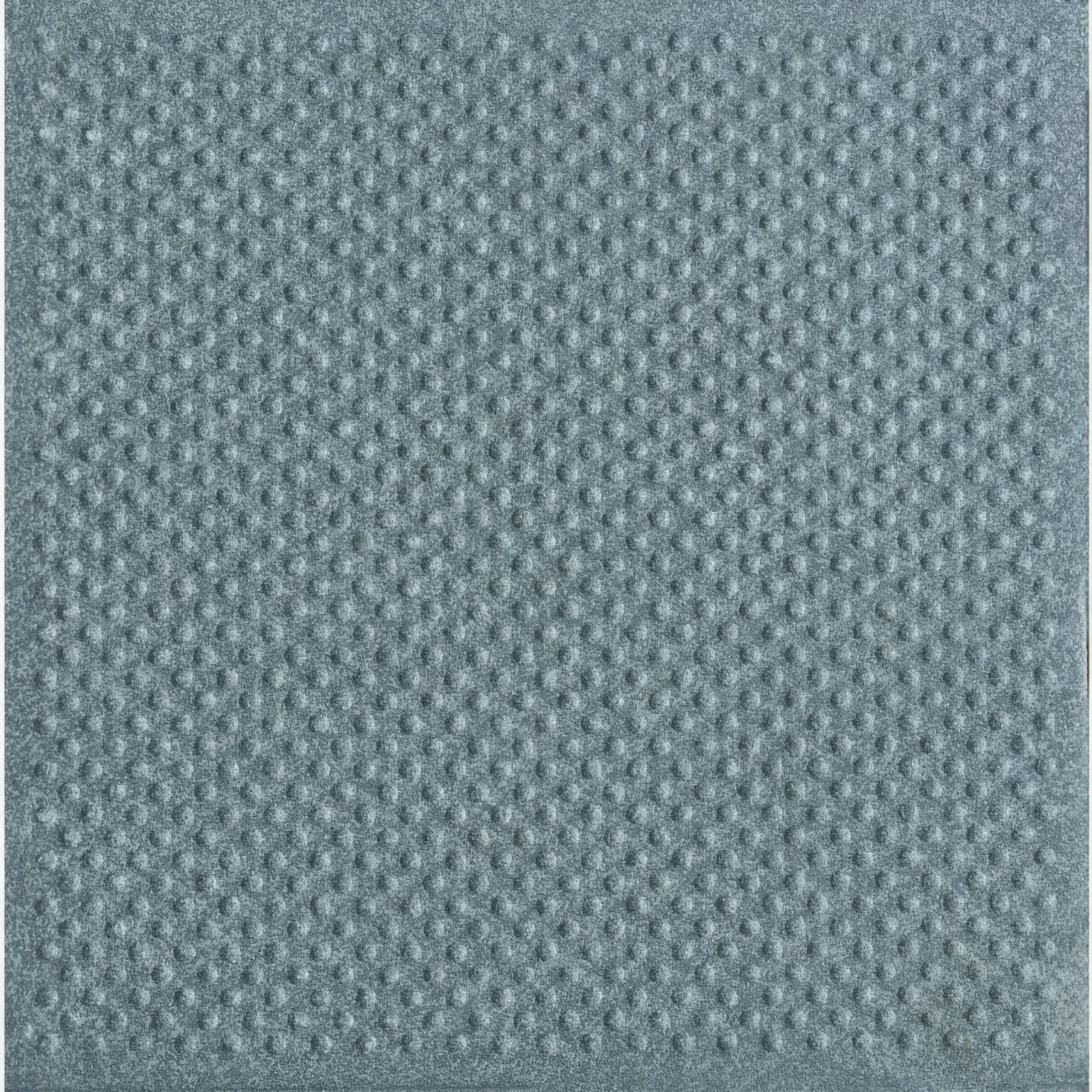 Dark grey pinhead quarry tile 148x148x9mm with blue-gray textured fabric and raised dot pattern surface