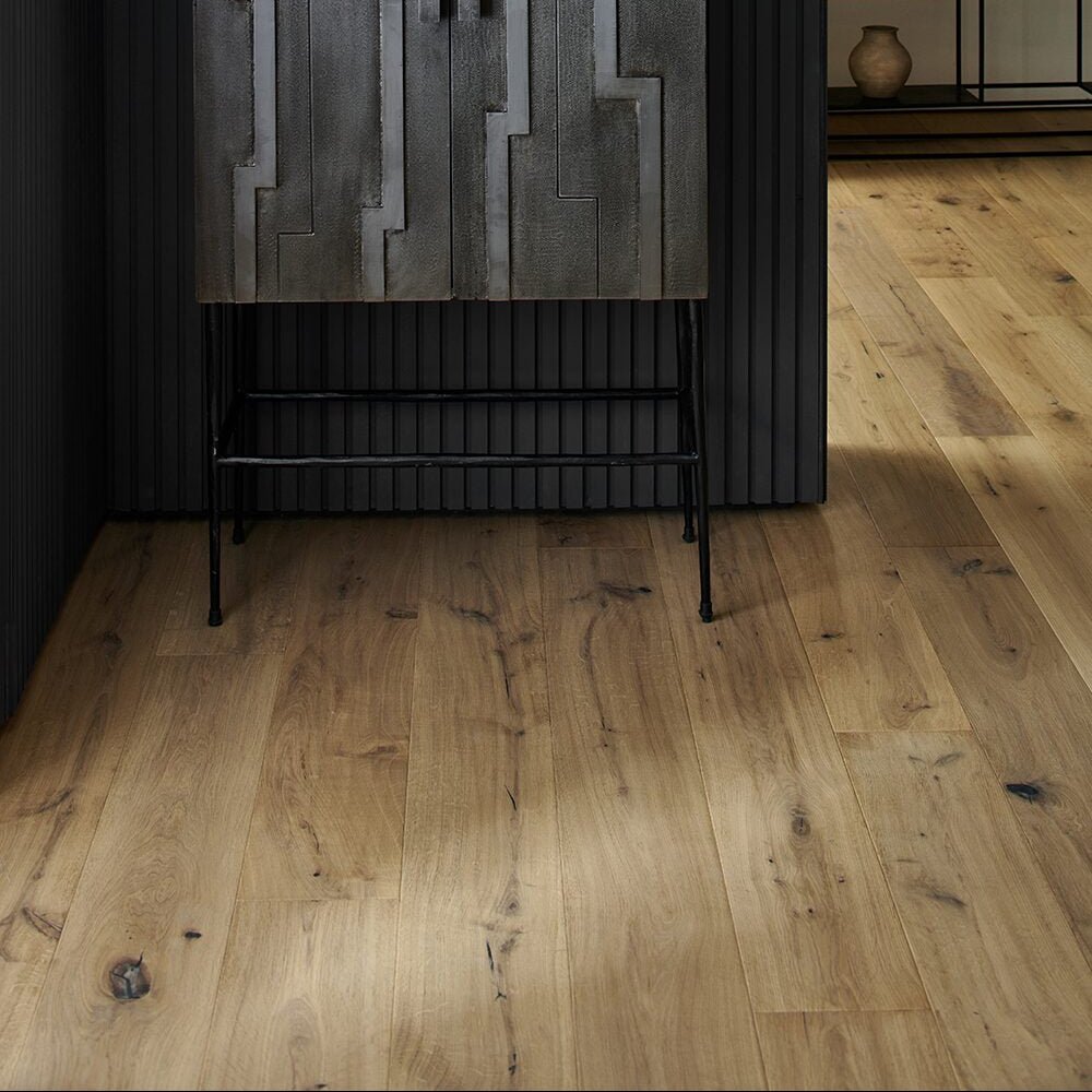 Light brown hardwood flooring with natural wood grain and subtle knots in dartmouth beaten oak finish