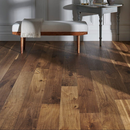 Warm-toned hardwood floor in Dartmouth Gingersnap Oak with varied natural wood grain and rich earthy tones