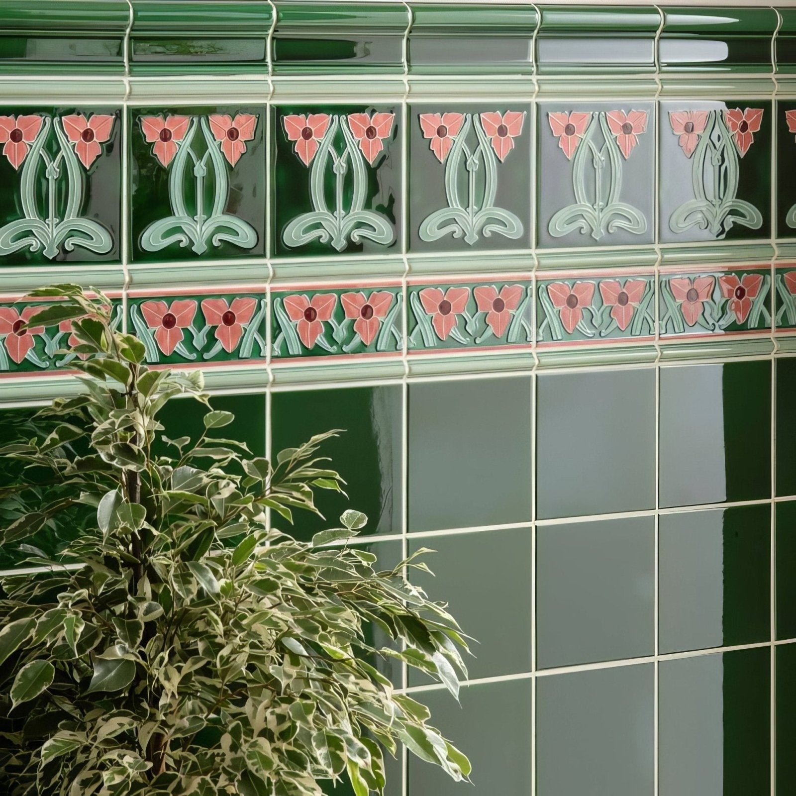 Dauphine border green ceramic tiles with pink and light green art nouveau floral patterns on victorian green background