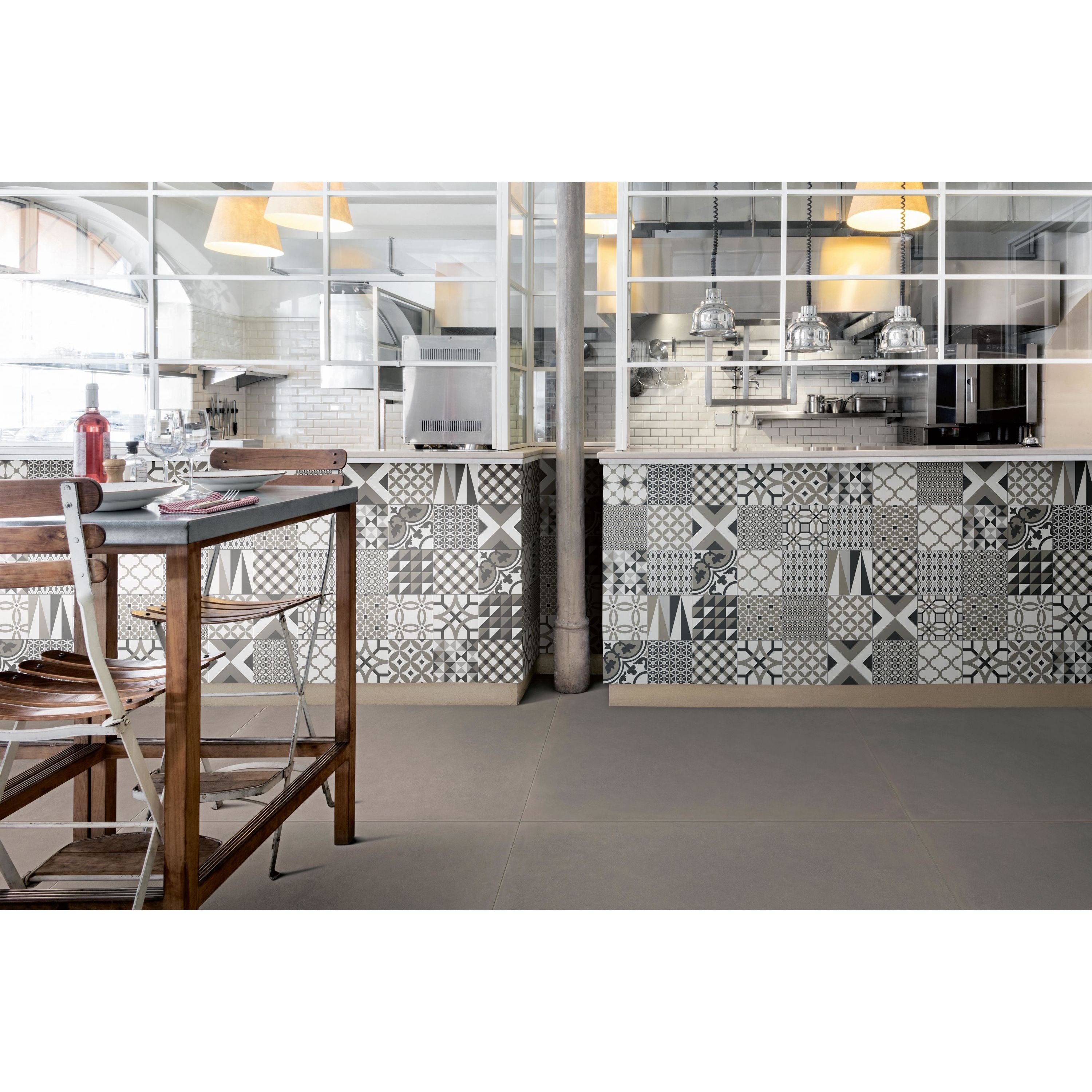 Black and white geometric patterned kitchen tiles from de-segni decor random cold mix ceramic collection