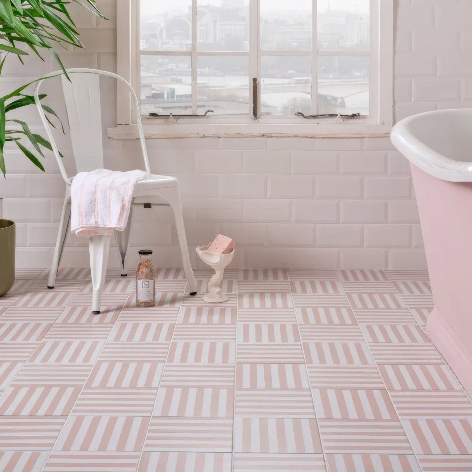Pink and white striped ceramic floor tiles in a geometric pattern from deck chair porcelain rose collection