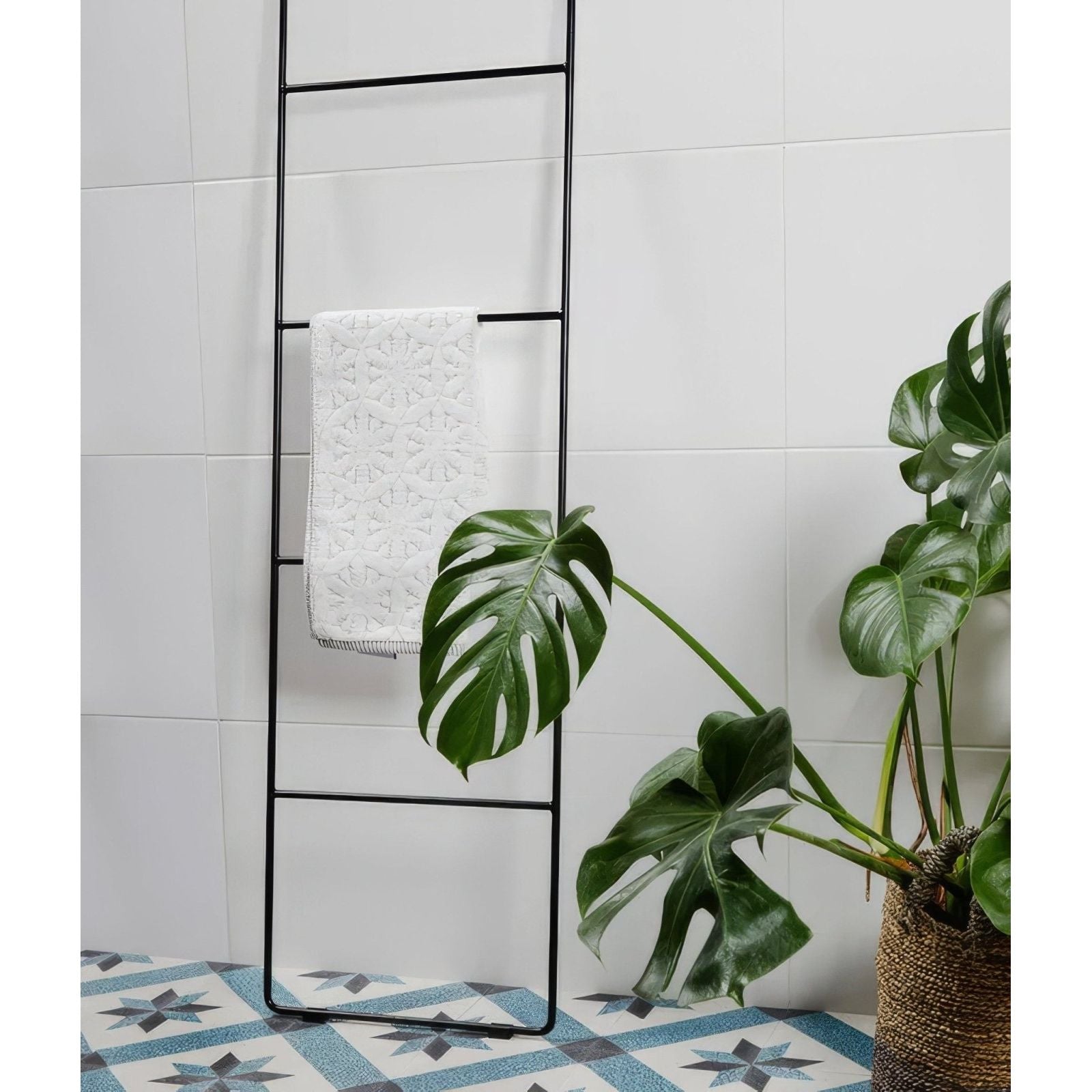 Delicate Wall Ceramic 33.3 x 55cm glossy white tiles with a black towel ladder