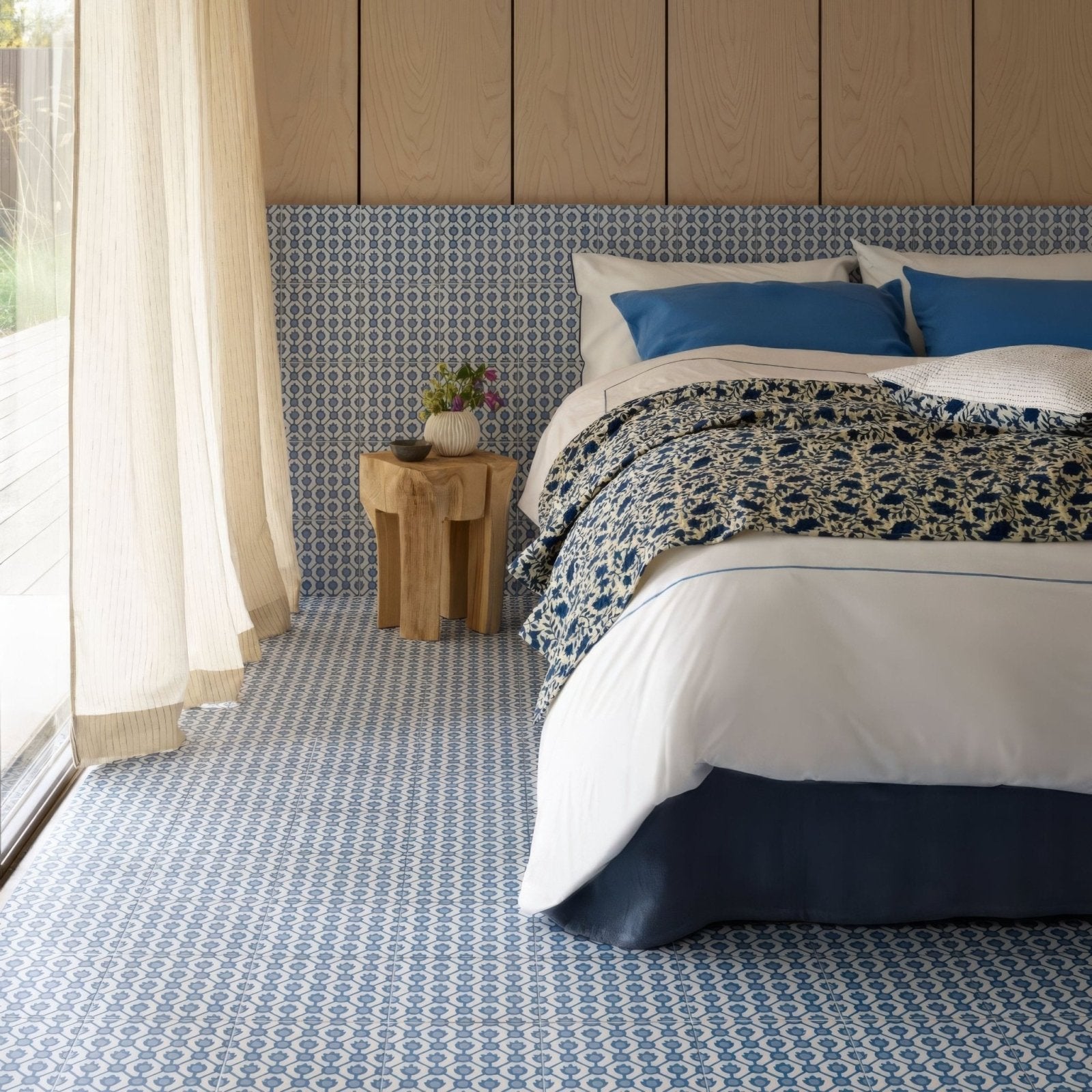 Blue and white geometric patterned ceramic floor tiles from designers guild jaal cobalt collection