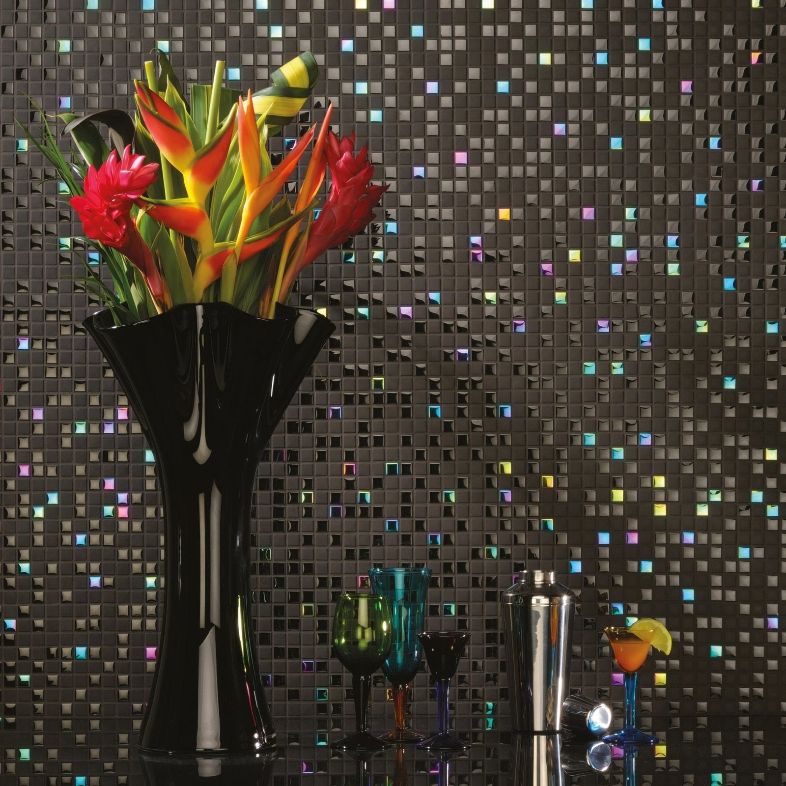 Dias Earth and Fire Mixed Mosaics black mosaic with iridescent accents and a black vase of tropical flowers
