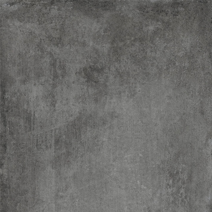 Direction dark matt 60 x 60cm dark gray concrete tile with a textured weathered surface suitable for flooring