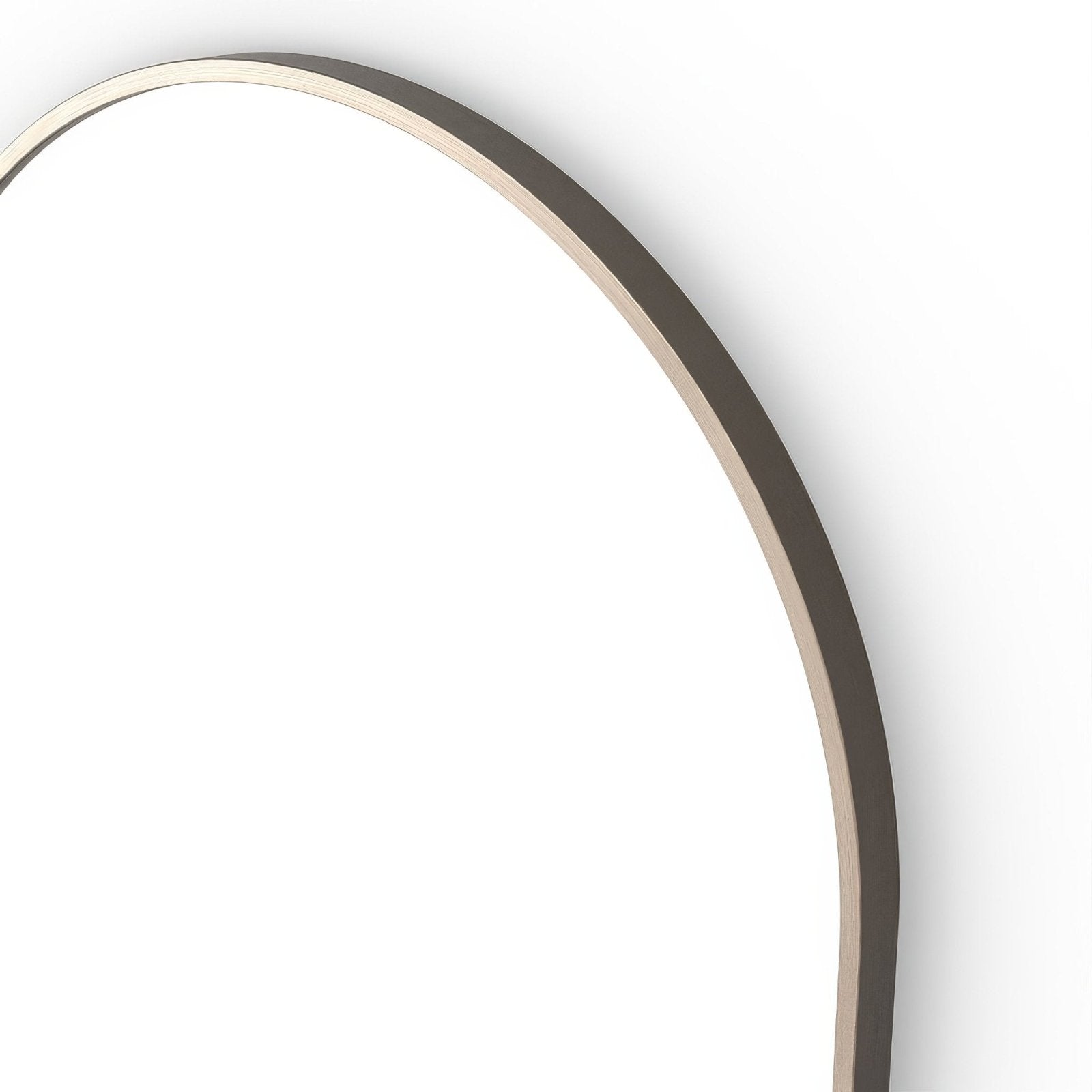 Docklands Capsule Mirror brushed bronze with a sleek oval shape and a thin brushed metallic frame in warm bronze finish