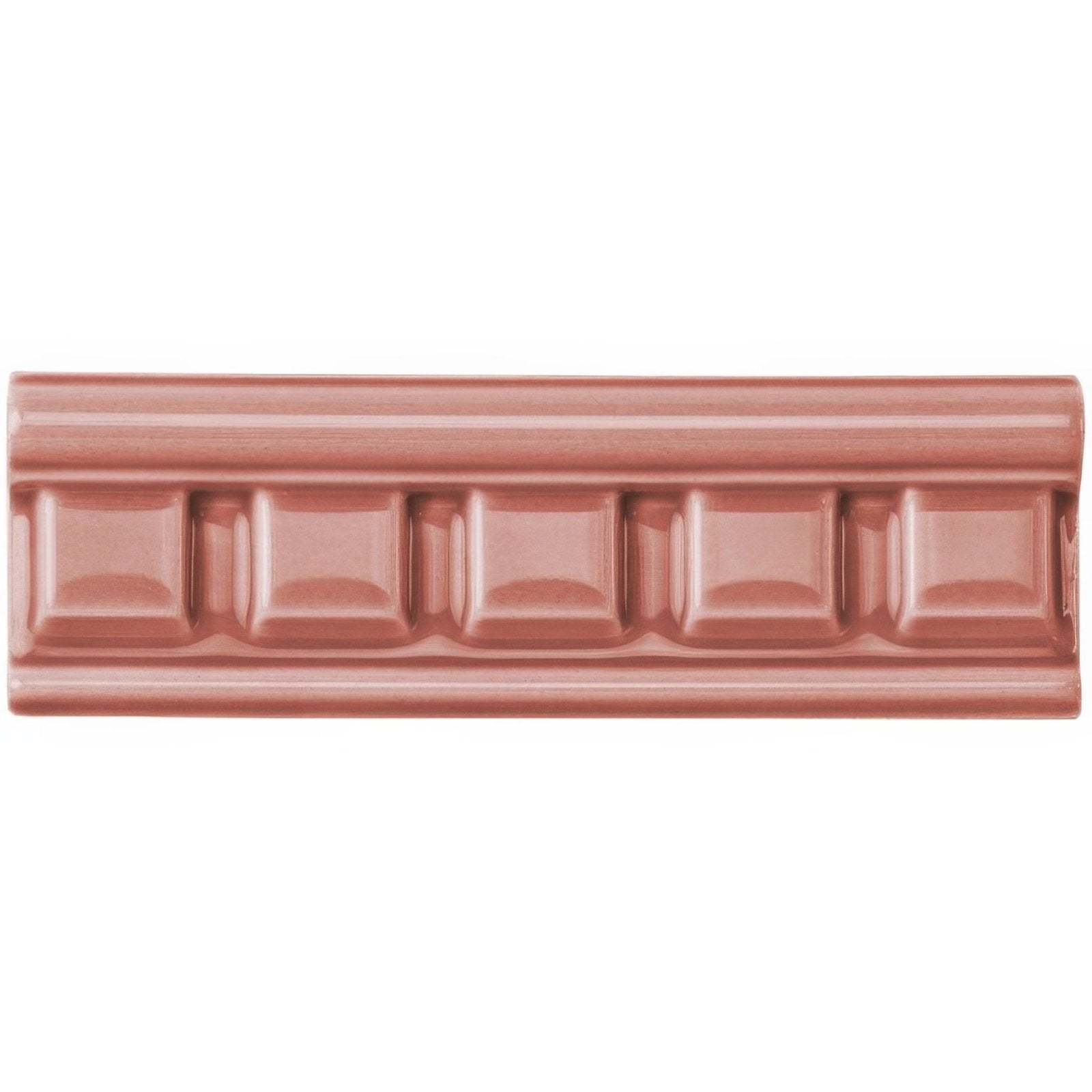 A glossy rose gold ceramic duchy pink dentil moulding tile with chocolate bar design and rounded indented squares